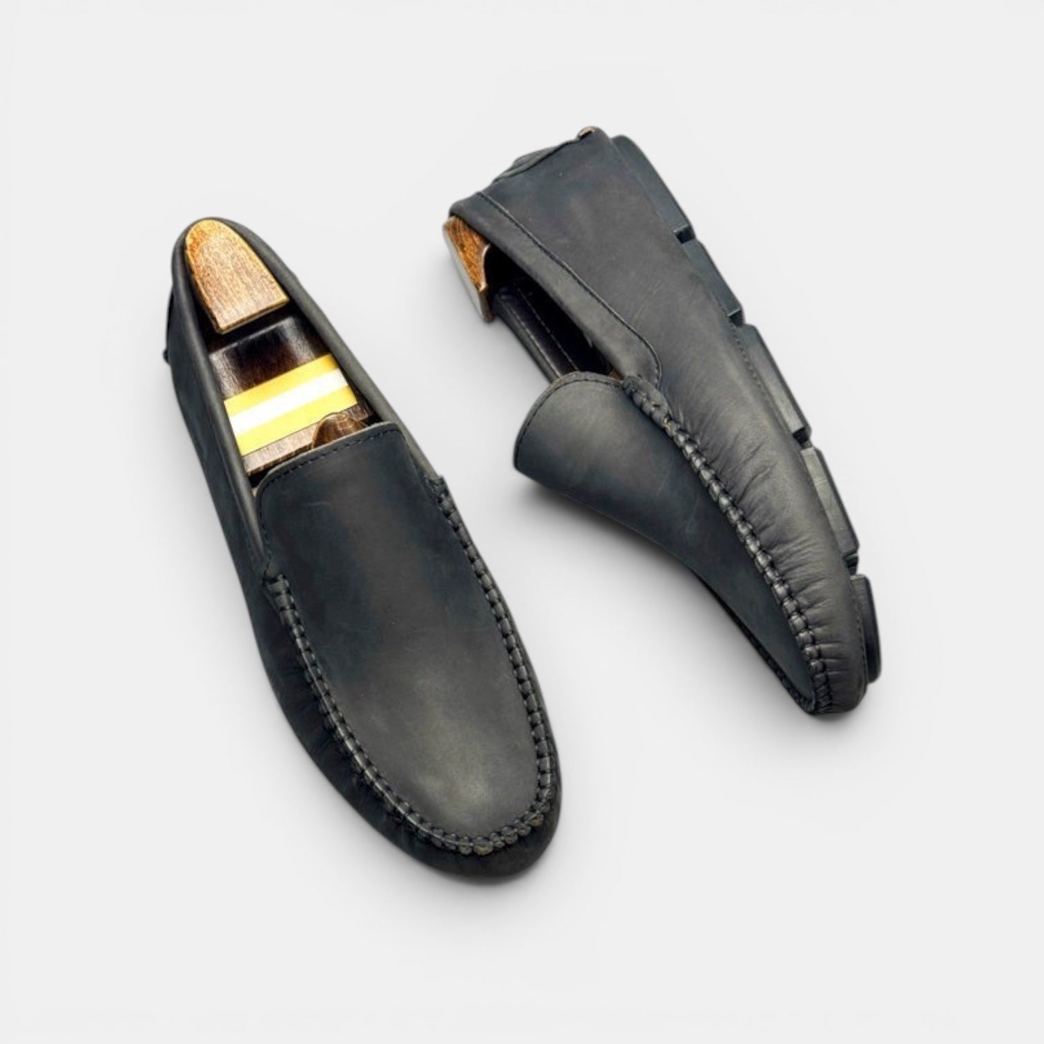 Barcon Getta Inc charcoal/dark grey full-grain leather driver slip-on loafers with hand-stitched moccasin construction.