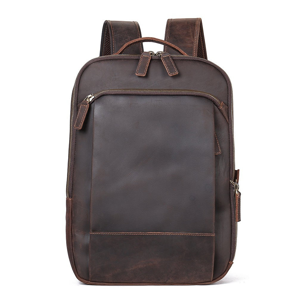 Barcon Getta Inc dark brown handmade Ethiopian leather backpack with multiple zipper pockets and padded straps.