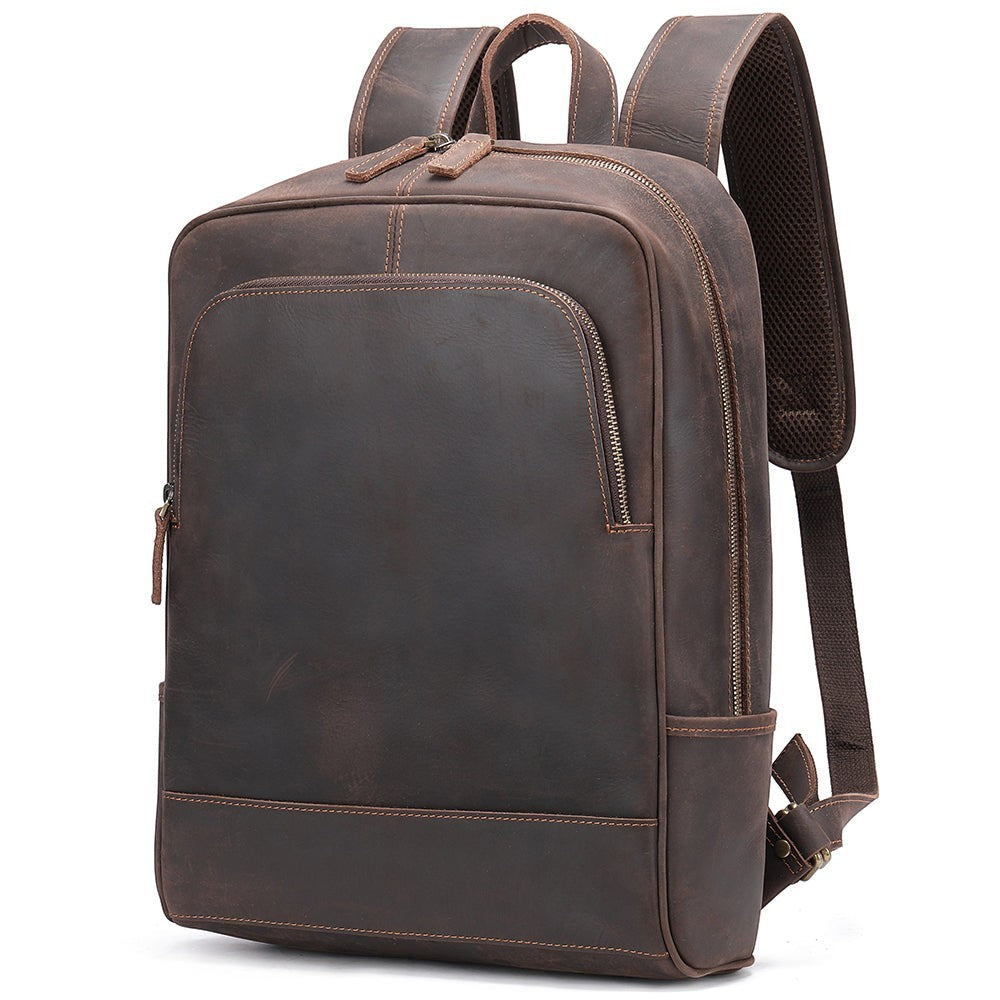 Barcon Getta Inc dark brown genuine leather backpack with front zip pocket and adjustable straps.