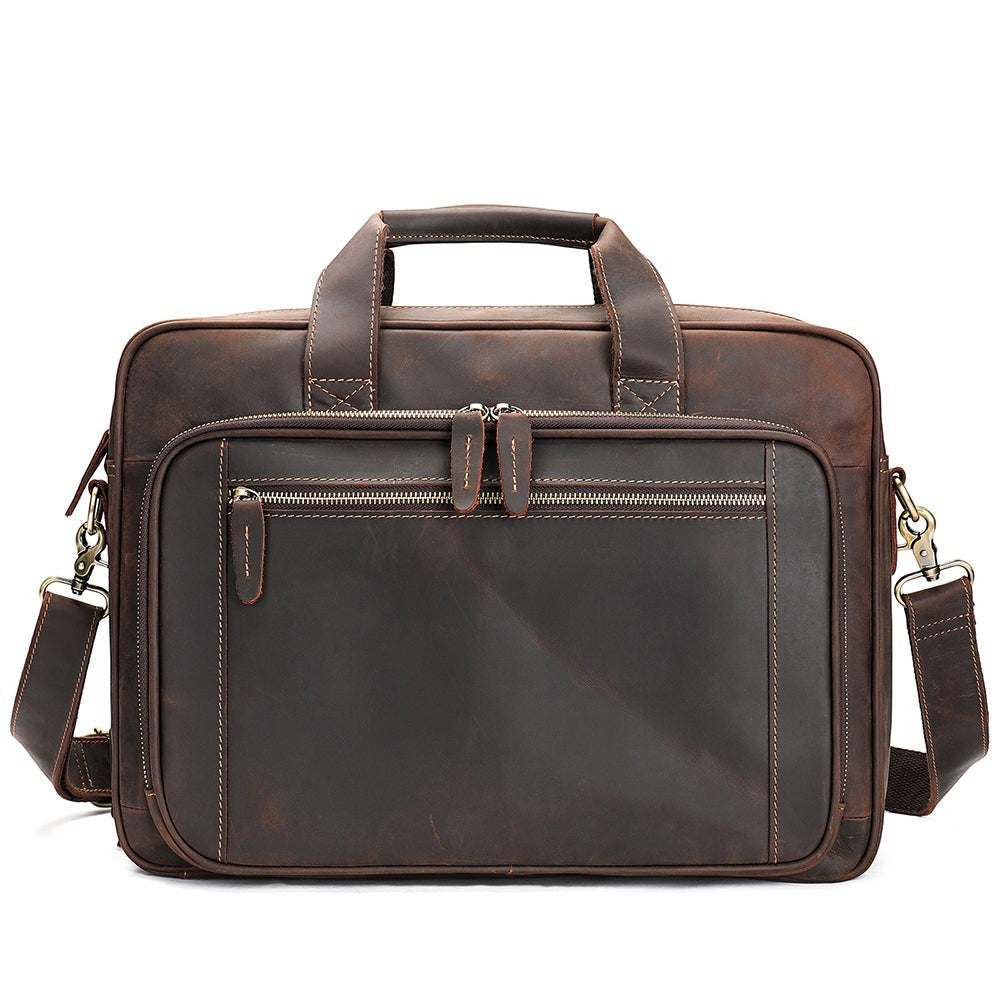 Barcon Getta Inc dark brown handmade Ethiopian leather briefcase with multiple zipper pockets and laptop compartment.