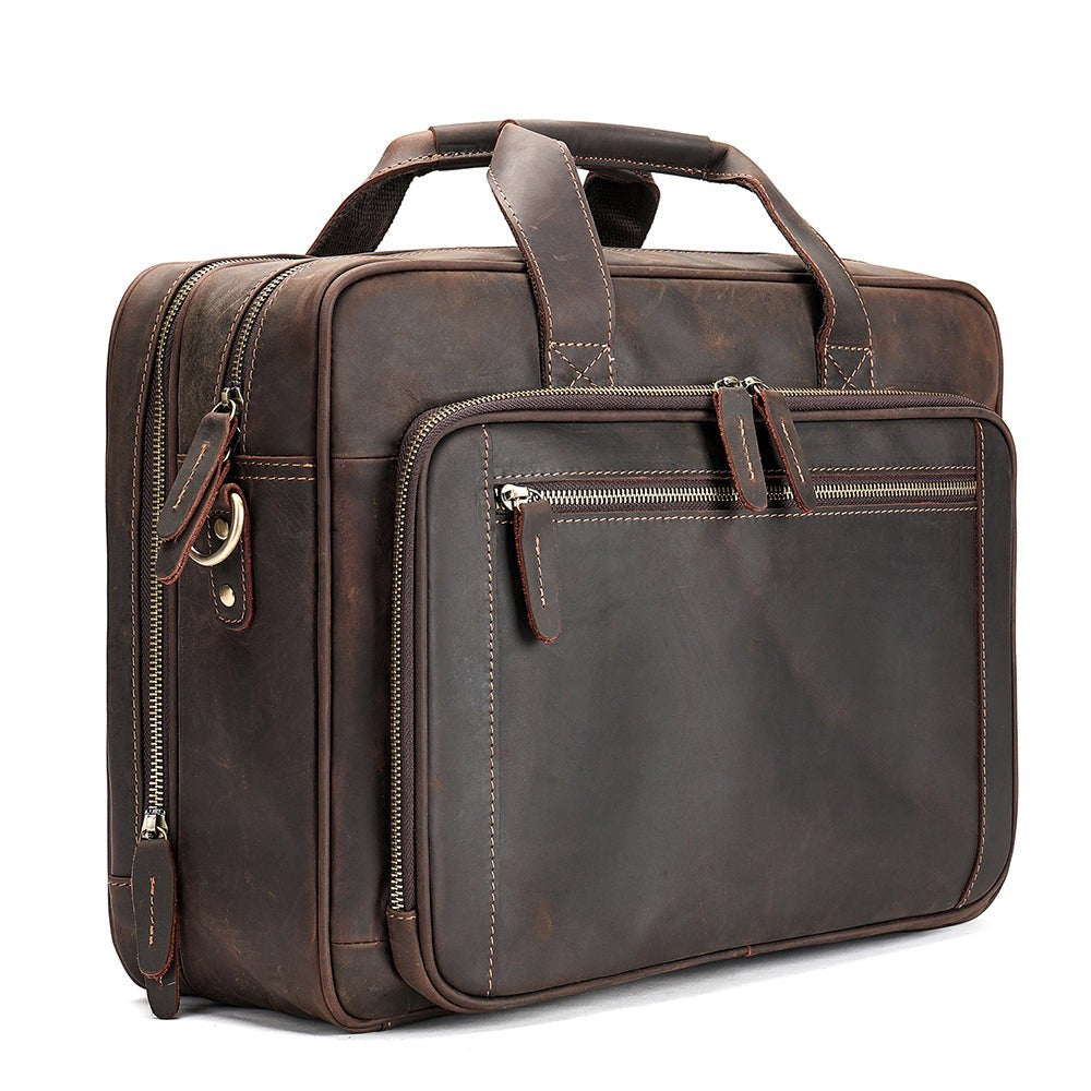Barcon Getta Inc dark brown handmade Ethiopian leather briefcase with multiple zipper pockets and comfortable handles.