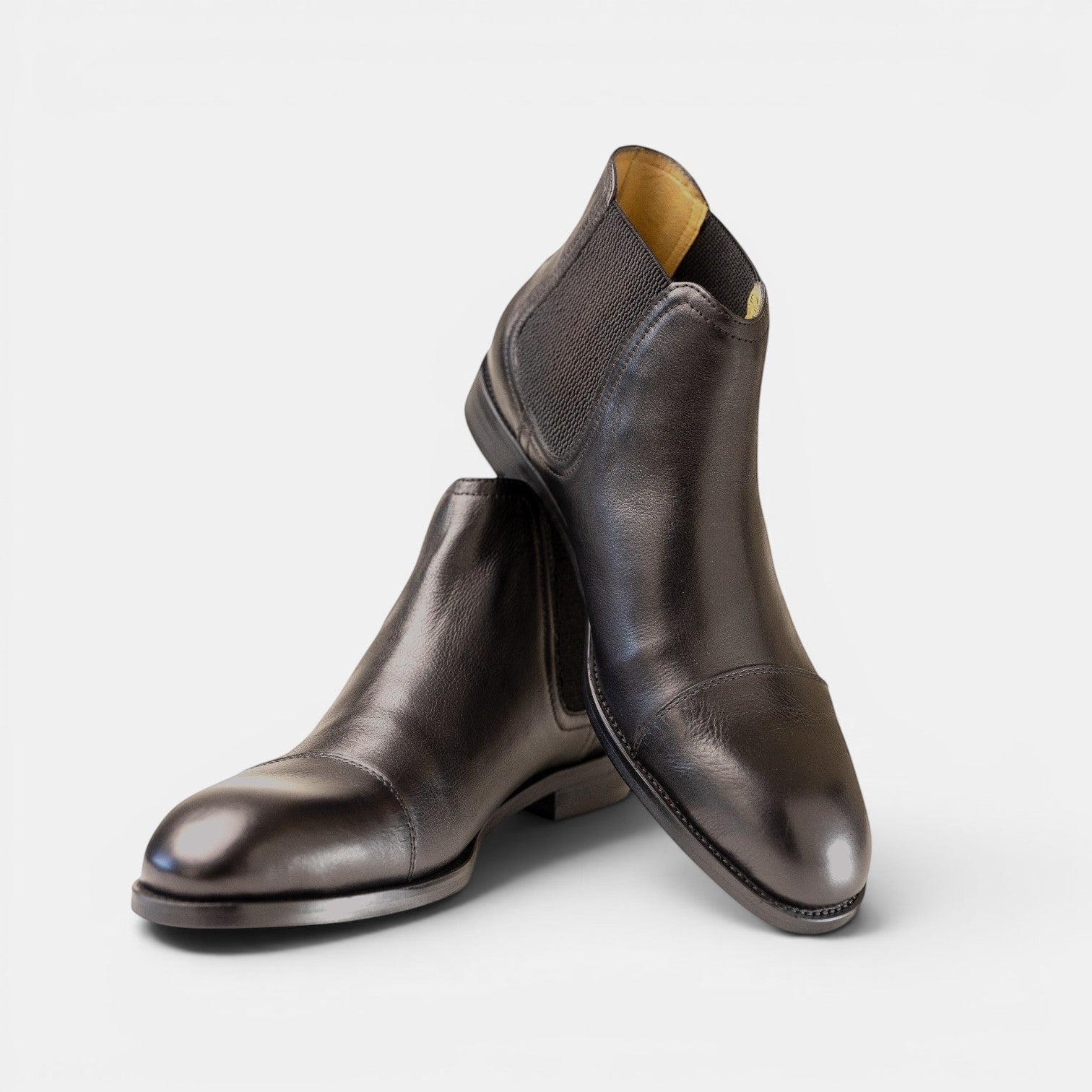 Barcon Getta Inc ADDIS ABABA dark brown leather Chelsea boots with cap toe and elasticated side panels.