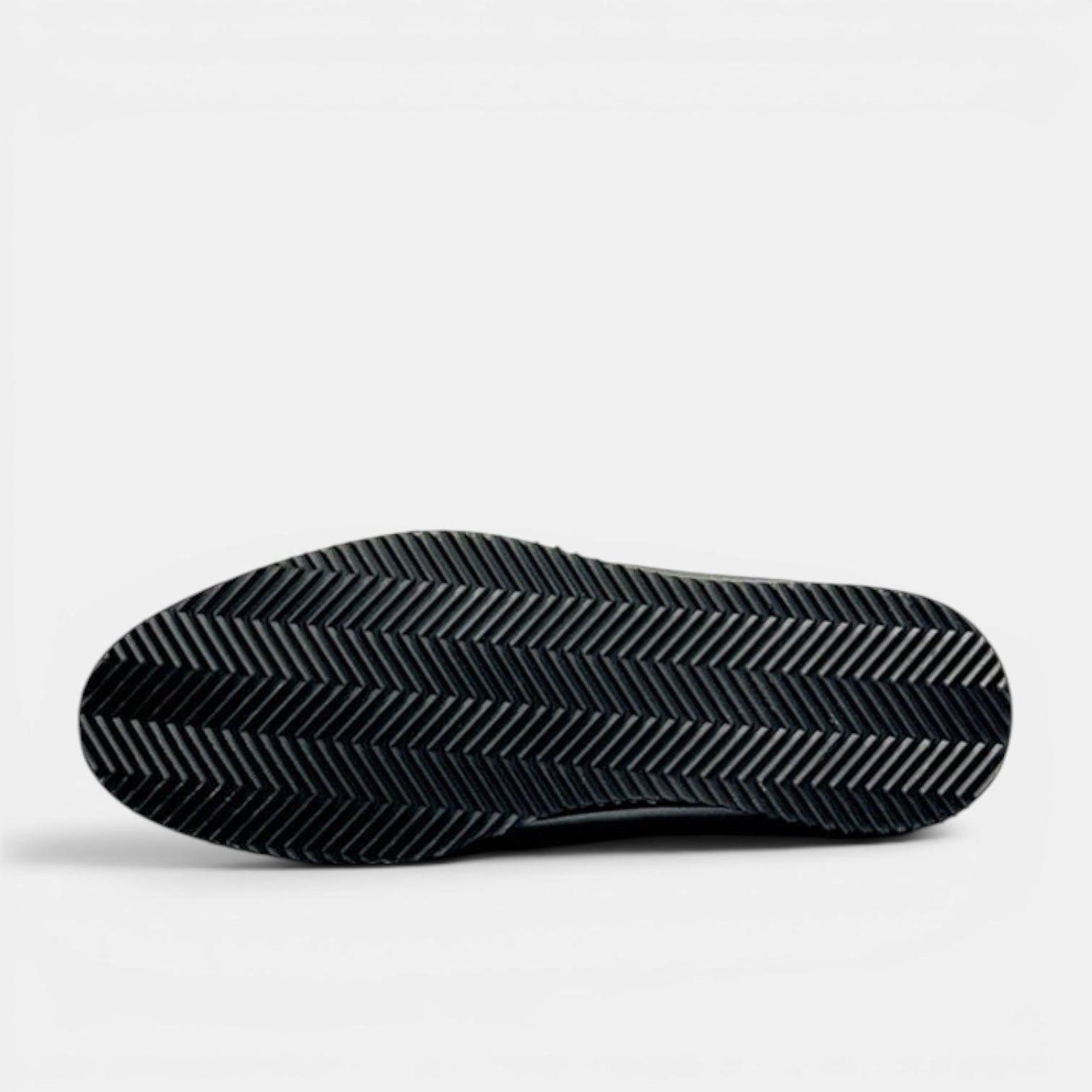 Barcon Getta Inc DESSIE CROSSOVER black leather dress shoes with sneaker sole and herringbone tread.