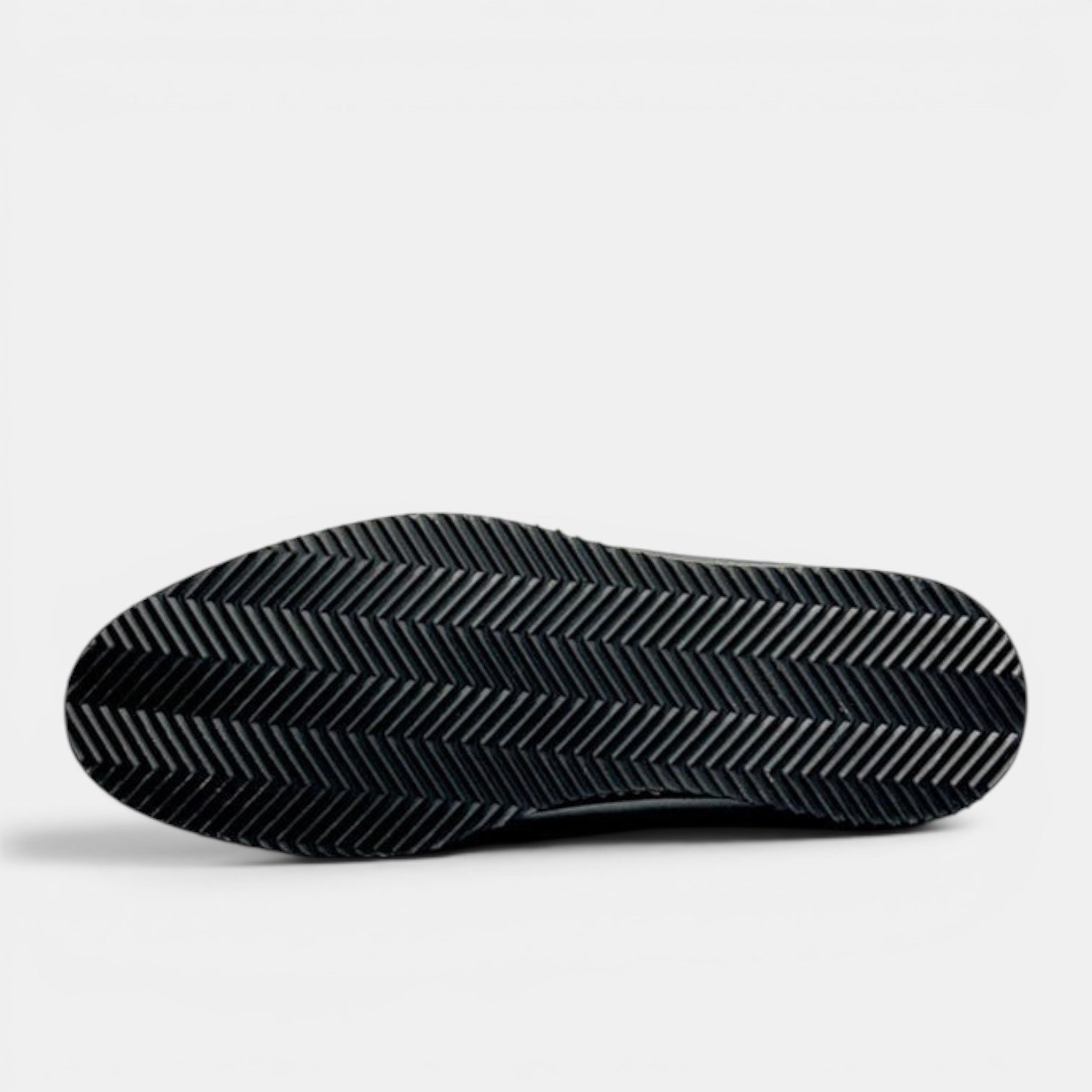 Barcon Getta Inc DESSIE CROSSOVER black leather dress shoes with sneaker sole and herringbone tread.
