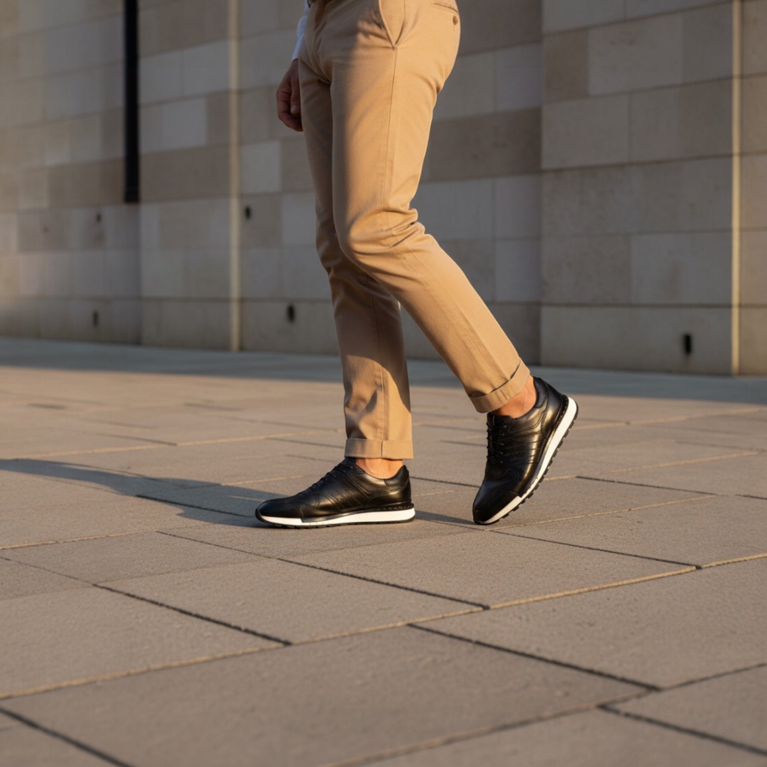 Barcon Getta Inc FREETOWN black leather cap toe sneakers with white midsole and lug sole.