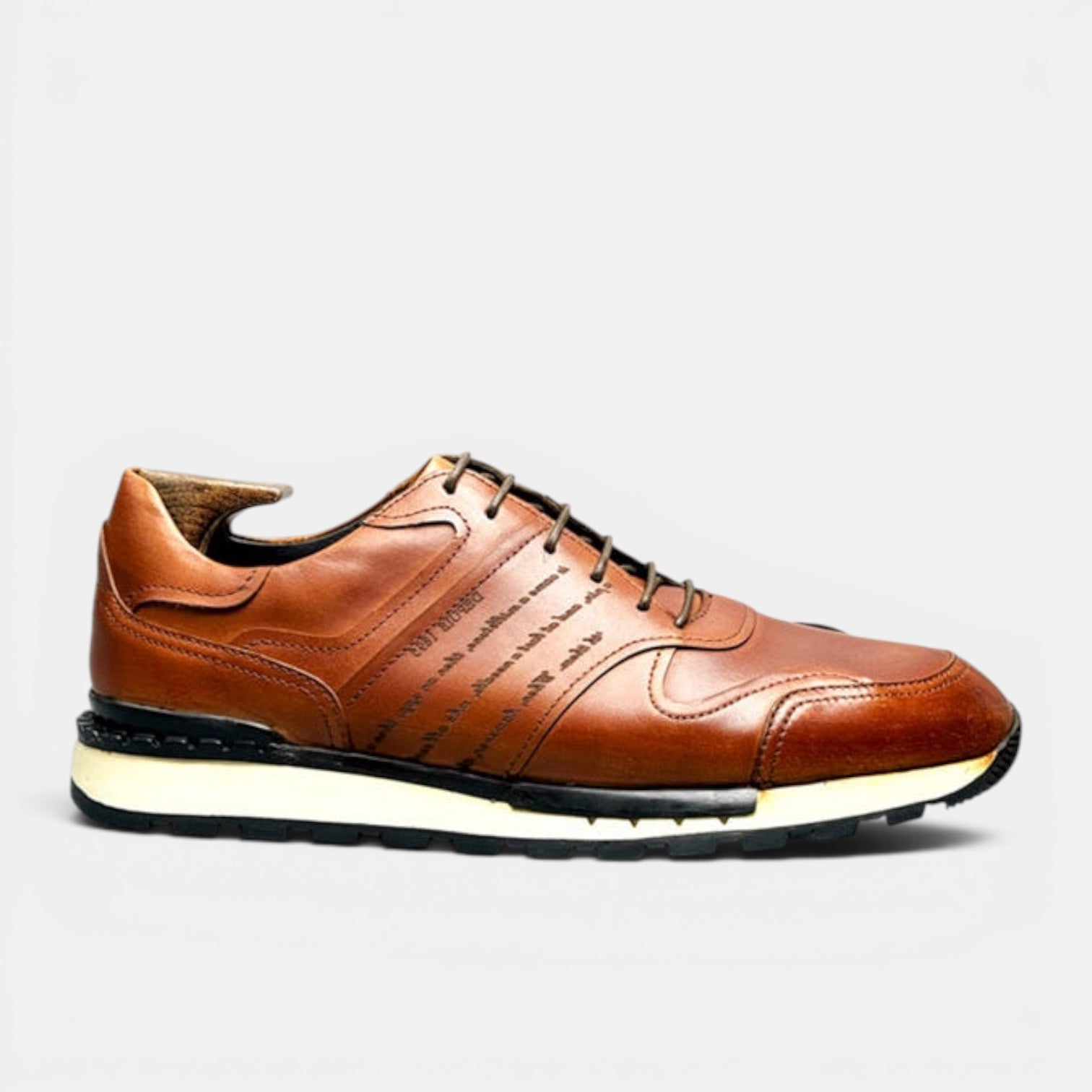 Barcon Getta Inc FREETOWN casual cognac tan leather sneakers with cap toe and embossed script on a chunky lug sole.
