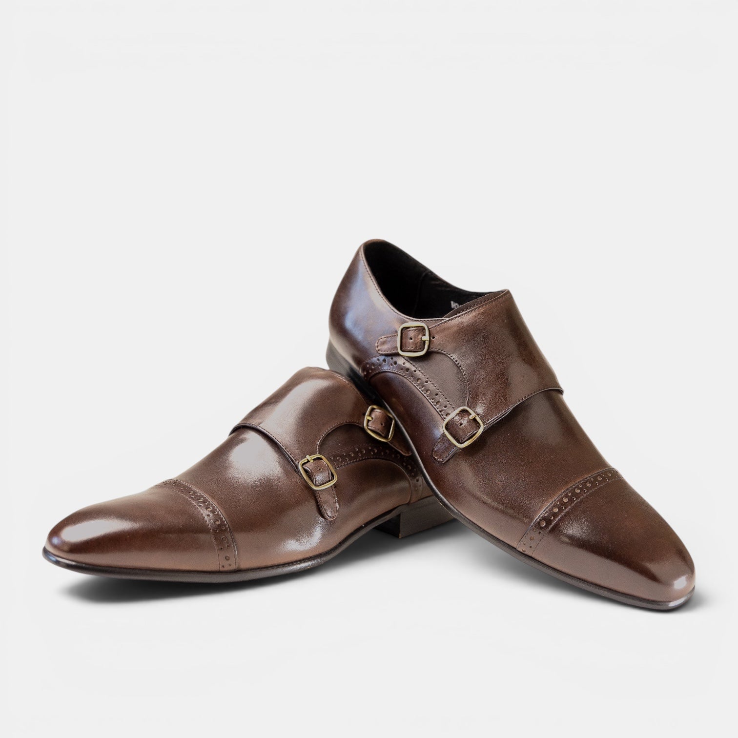 Barcon Getta Inc GABORONE double monk strap dress shoes in polished chocolate brown full grain leather with cap toe and gold buckles.