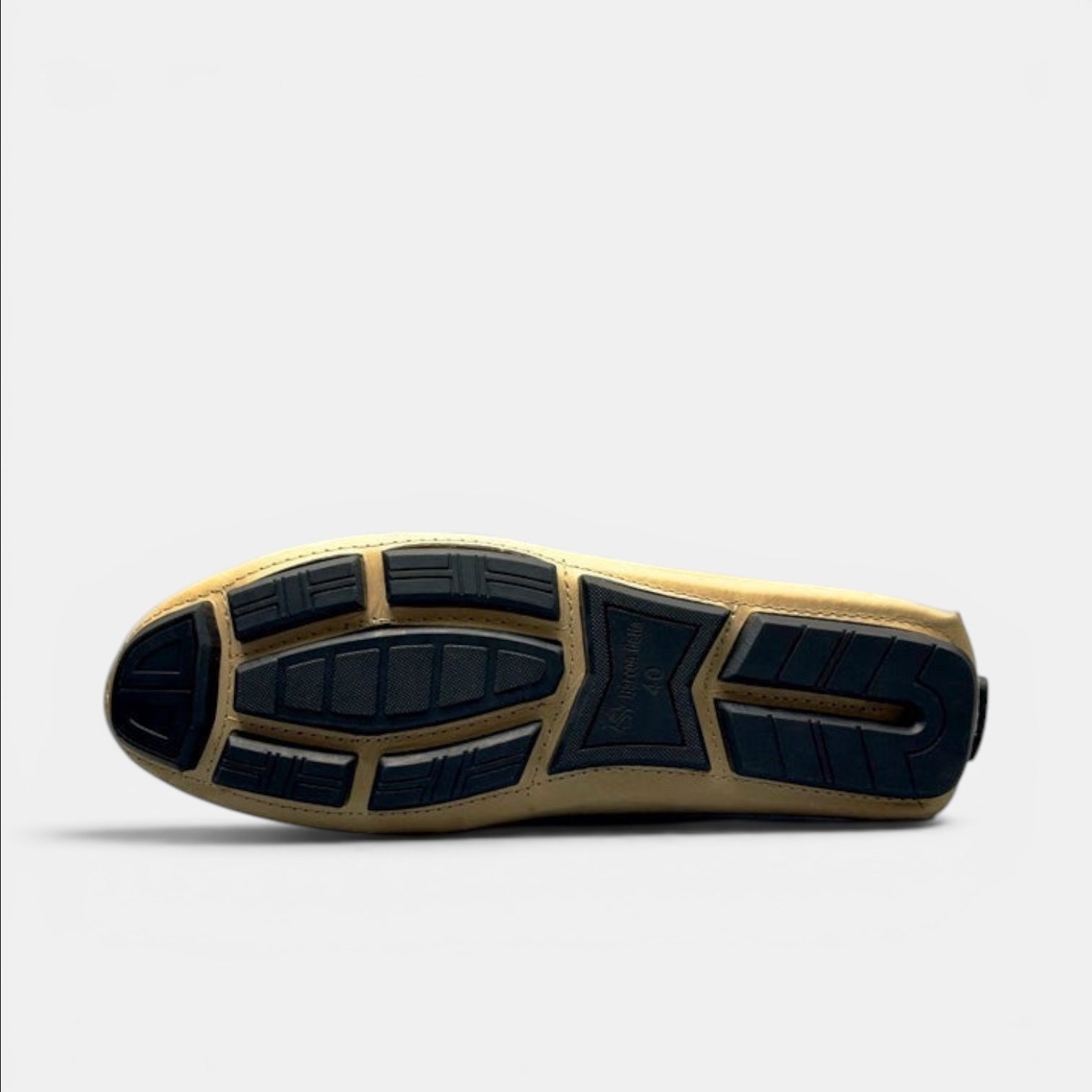 Barcon Getta Inc. gold/champagne full-grain leather loafer with segmented rubber driver sole.