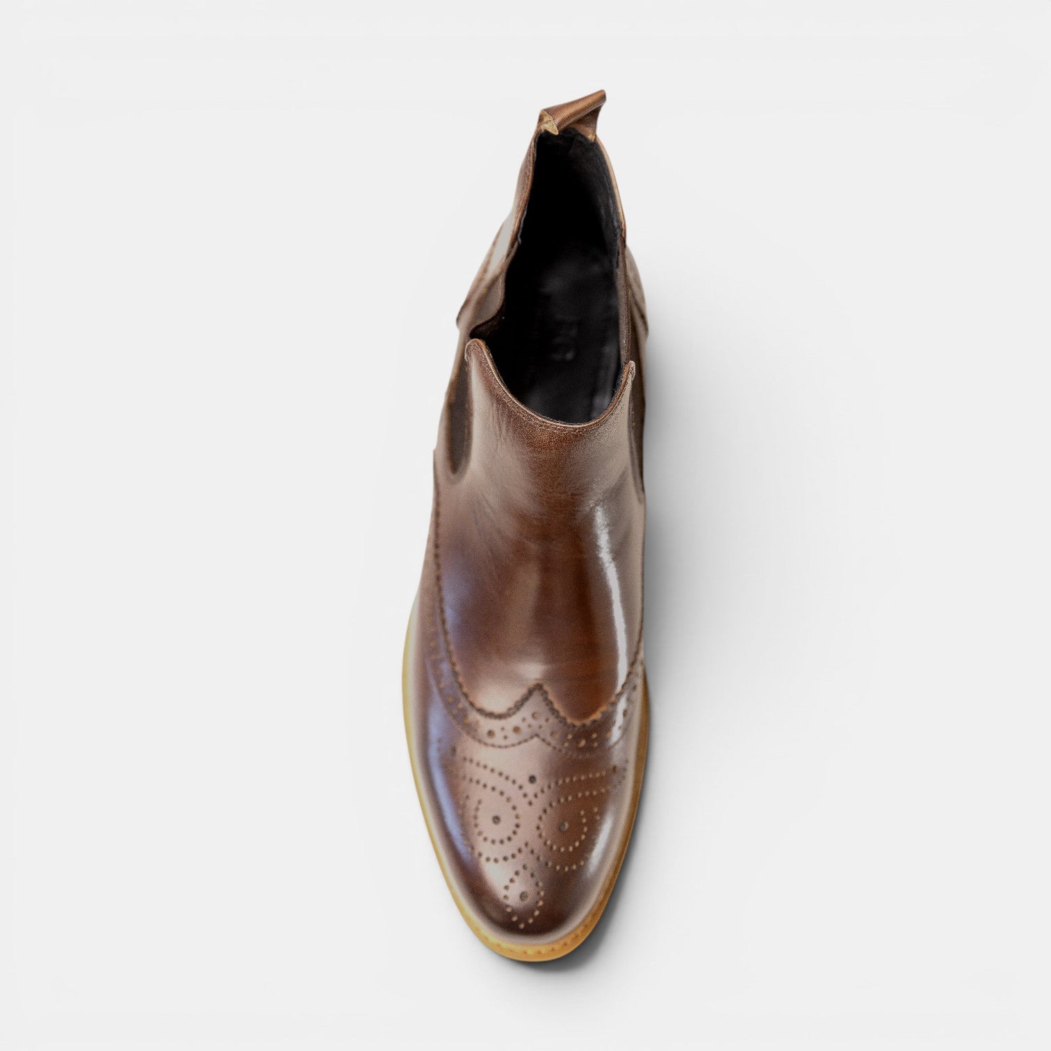 Barcon Getta Inc JOHANNESBURG brown leather wingtip Chelsea boots with brogue detailing and elasticated side panels.