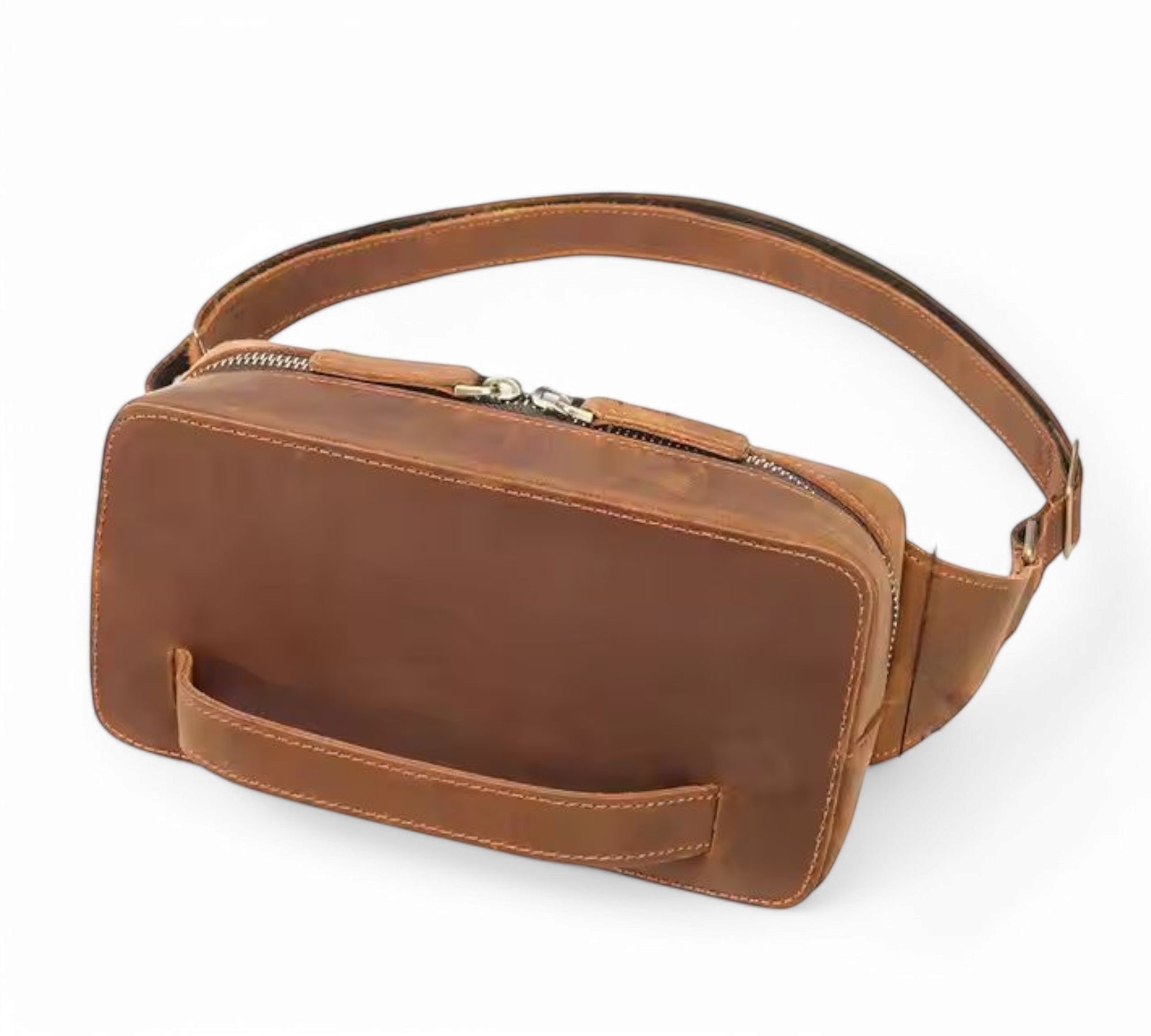 Barcon Getta Inc KANO fanny bag in brown full grain leather with a top zipper and front handle.