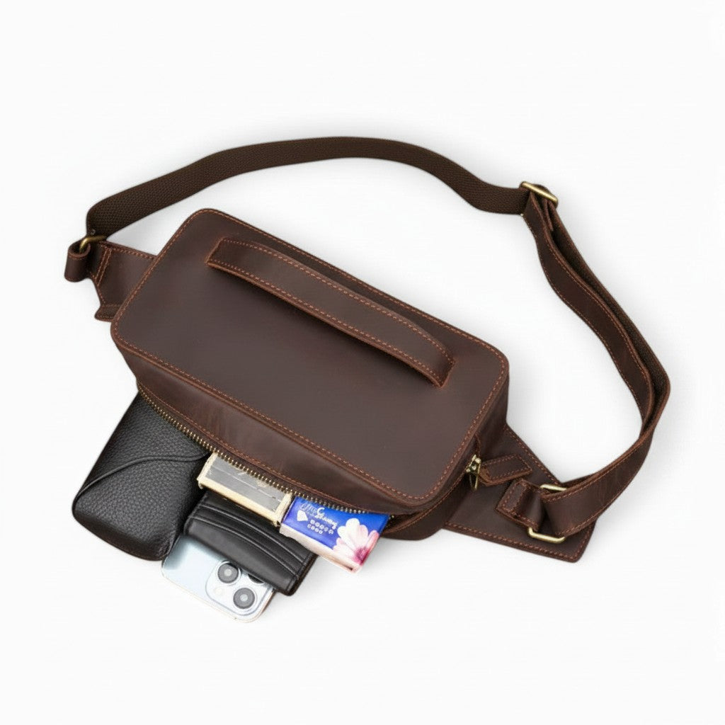 Barcon Getta Inc KANO fanny bag in brown full grain leather with multiple carrying styles. Includes main and internal zipper pockets.