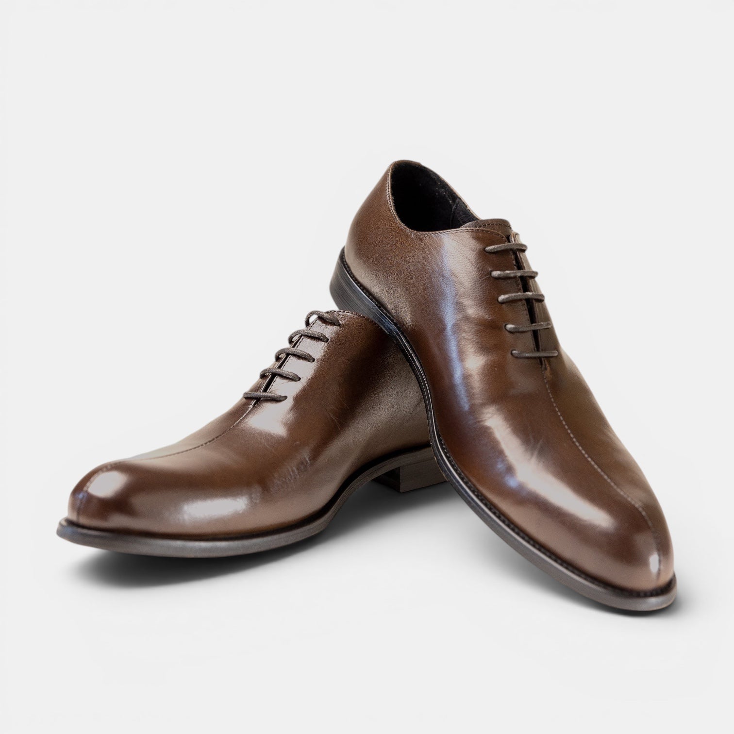 Barcon Getta Inc LOBAMBA whole-cut Oxford dress shoes in hand-burnished cognac brown full grain leather with a single toe split seam.