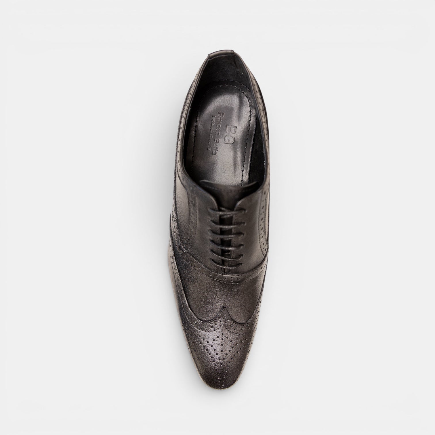 Barcon Getta Inc LOME wingtip Oxford dress shoes in deep charcoal graphite with blue iridescence. Full brogue perforations and medallion toe.