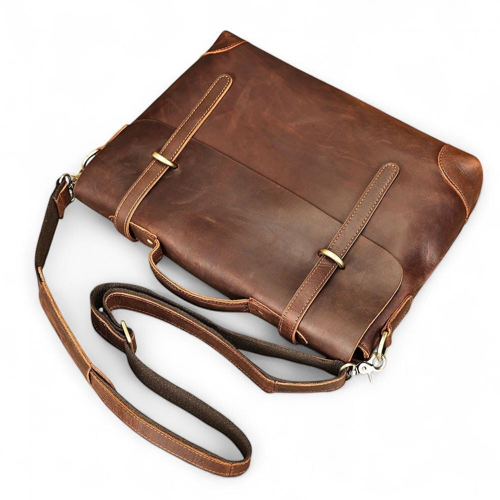 Barcon Getta Inc MANGECHA brown full grain leather briefcase with adjustable strap, multiple pockets, fits 16" laptop.