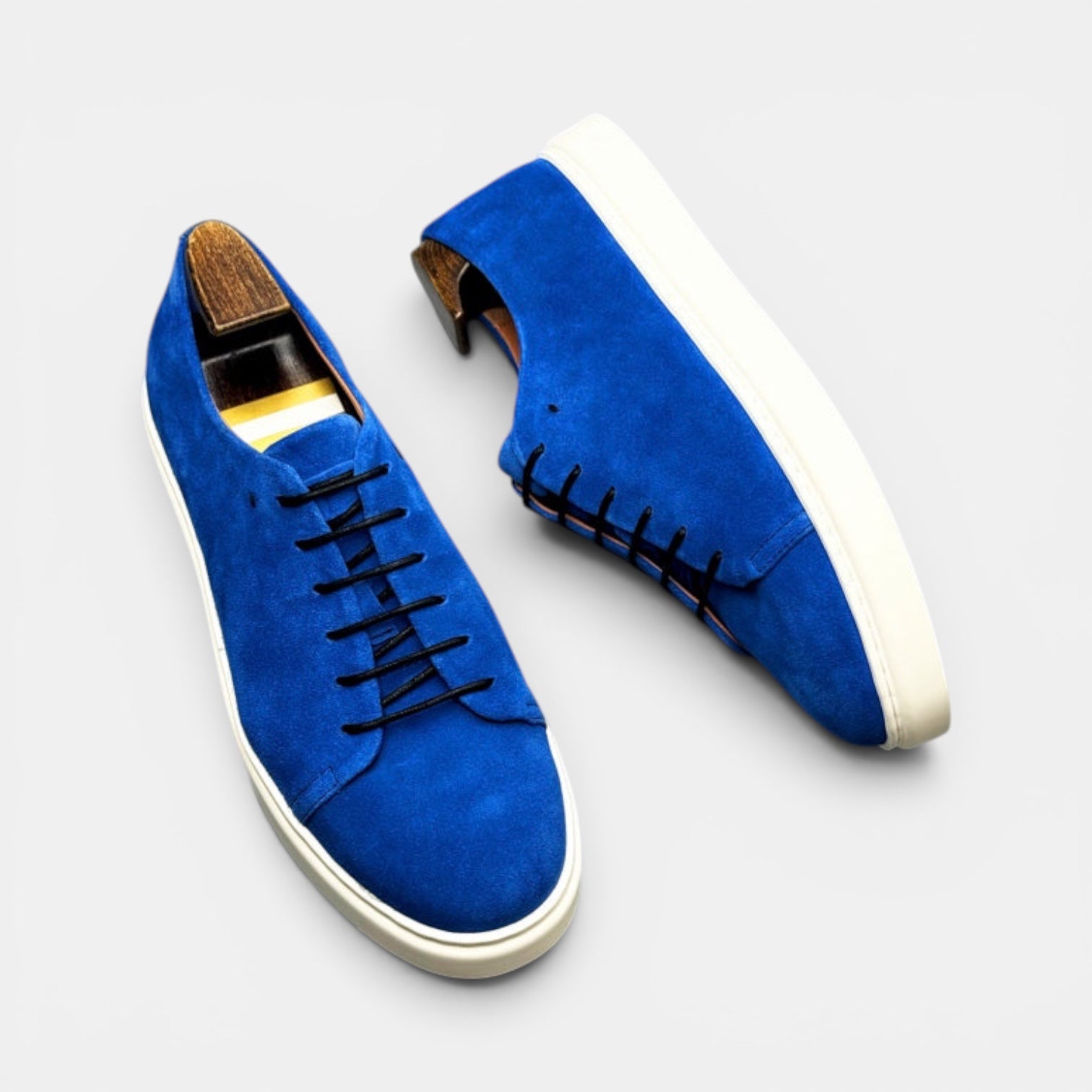 Barcon Getta Inc MEDA LOW TOP SUEDE sneakers in cobalt blue suede with white stitching and white rubber soles.