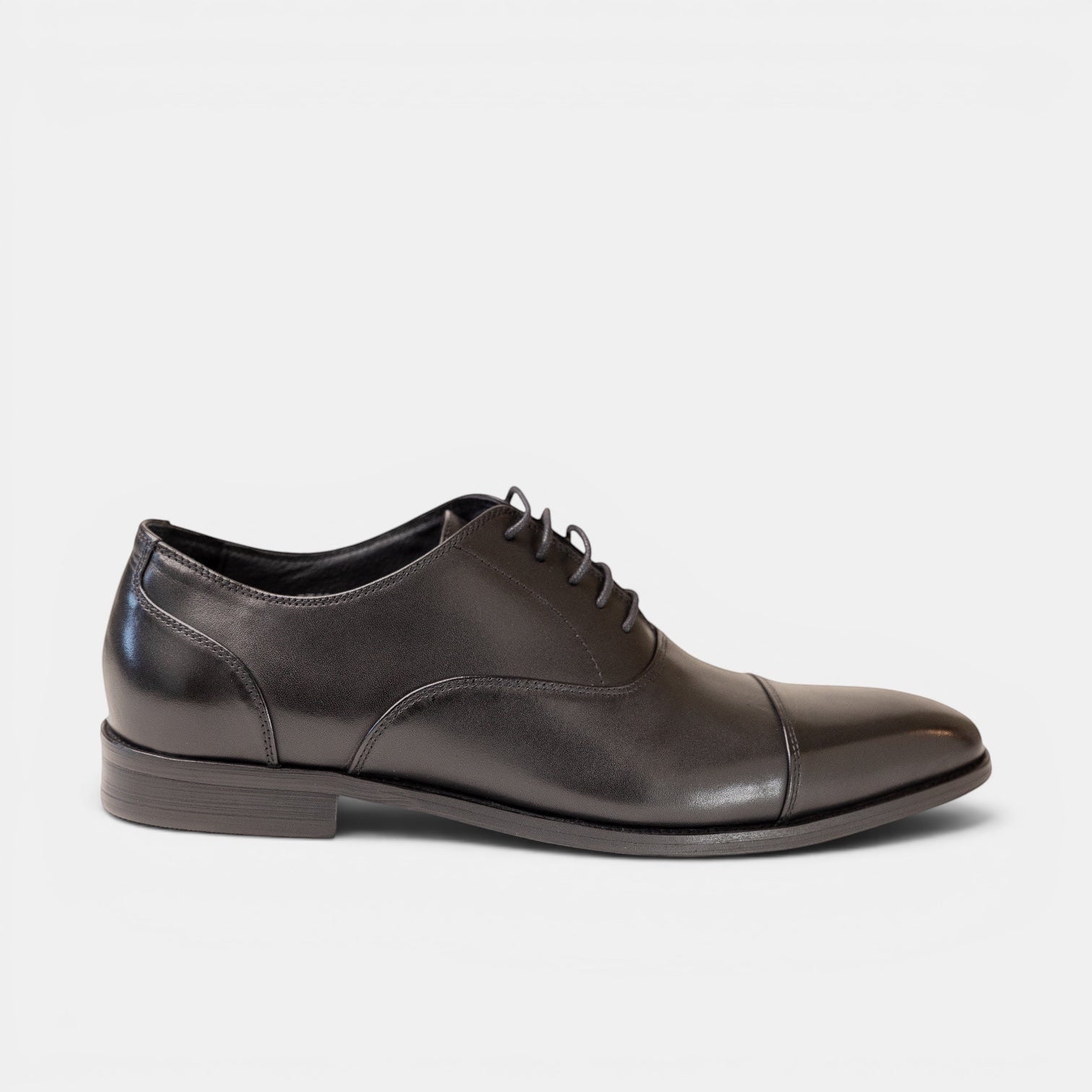 Barcon Getta Inc MOGADISHU black full grain leather cap toe Oxford dress shoe with closed lacing.