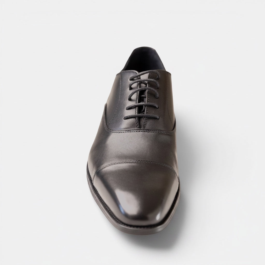 Barcon Getta Inc MOGADISHU black full grain leather cap toe Oxford dress shoe with closed lacing.