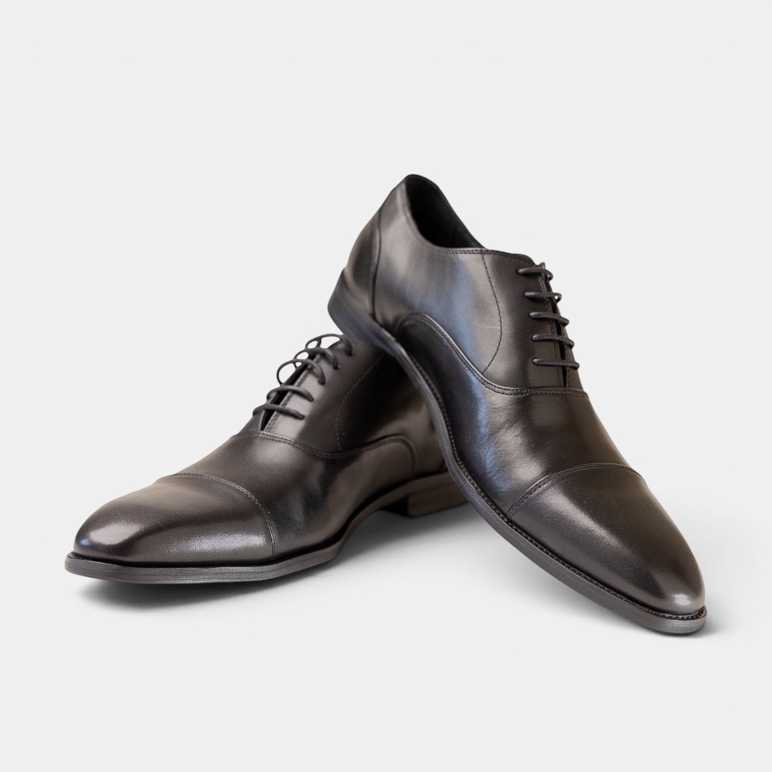 Barcon Getta Inc MOGADISHU black full grain leather cap toe Oxford dress shoes with closed lacing.