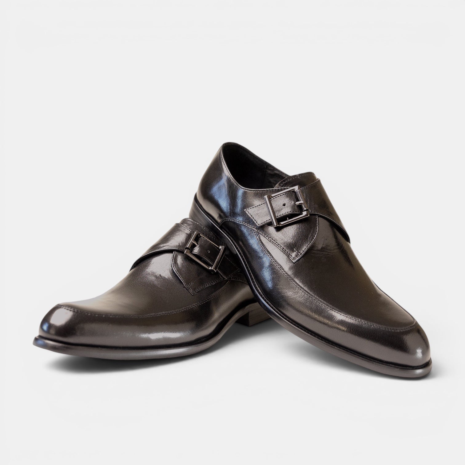 Barcon Getta Inc MORONI gunmetal black single monk strap dress shoes with blue iridescence and apron toe.