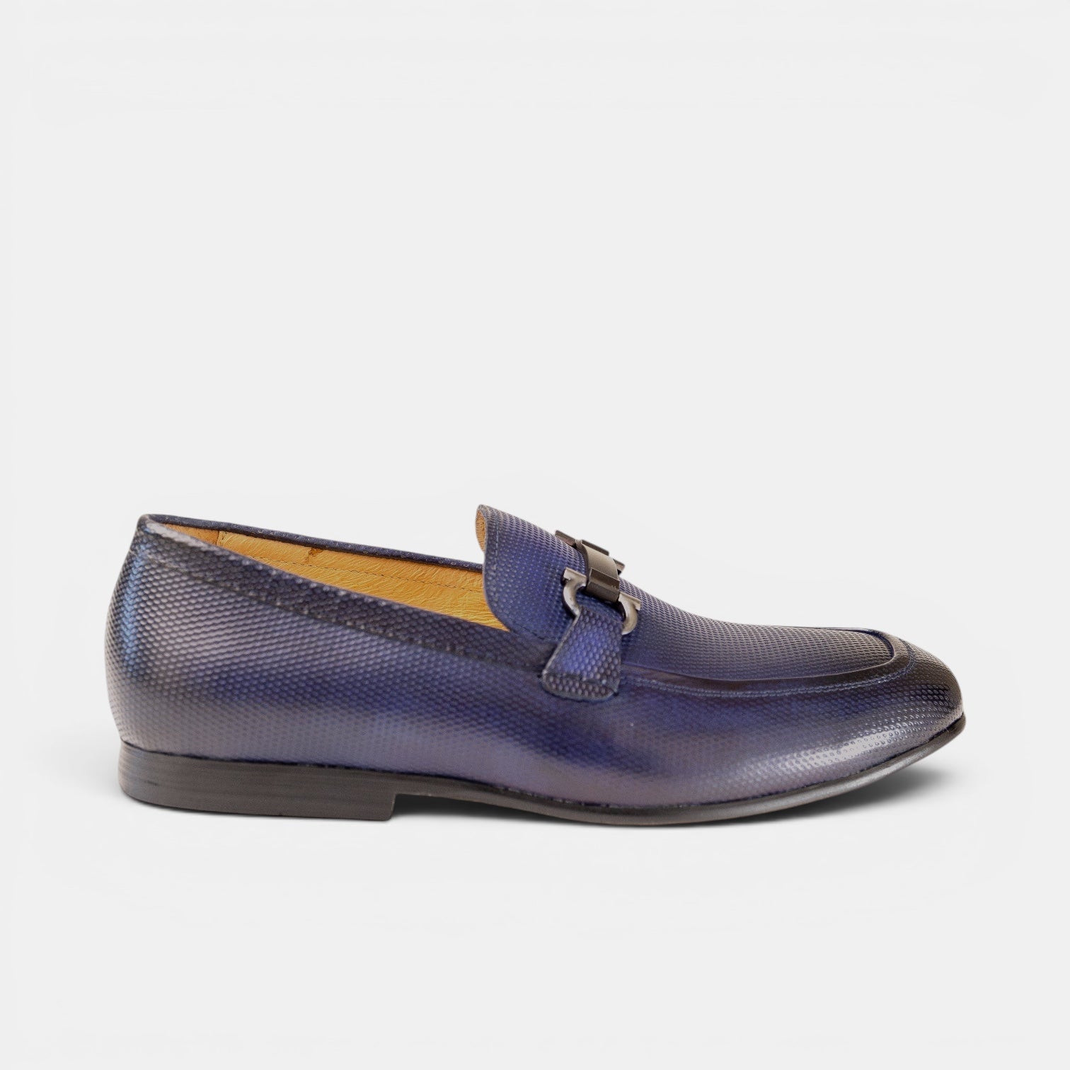 Barcon Getta Inc NAMPULA navy blue textured full-grain leather horsebit loafer with gunmetal hardware.