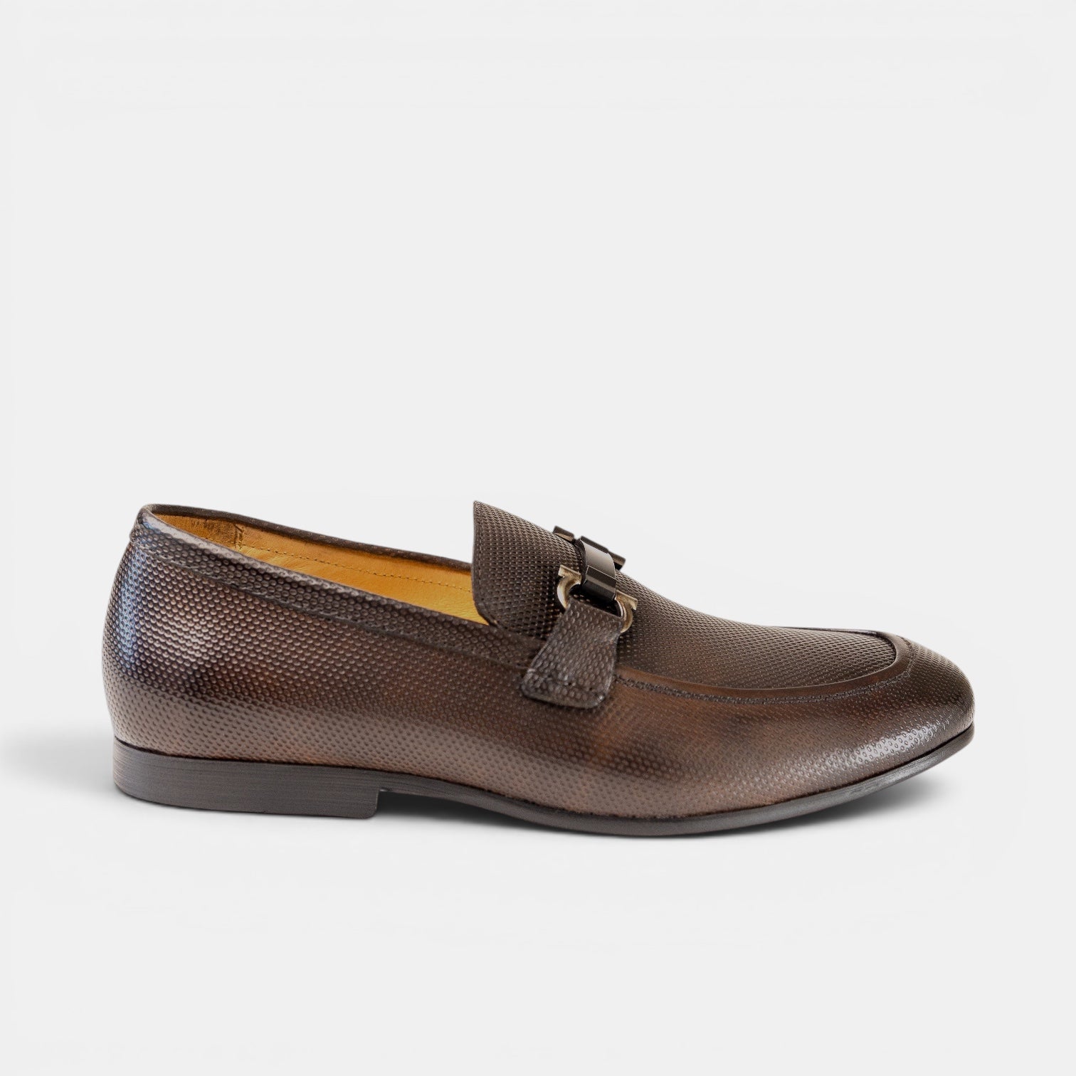 Barcon Getta Inc NAMPULA espresso brown textured full grain leather horsebit loafer with gunmetal hardware.