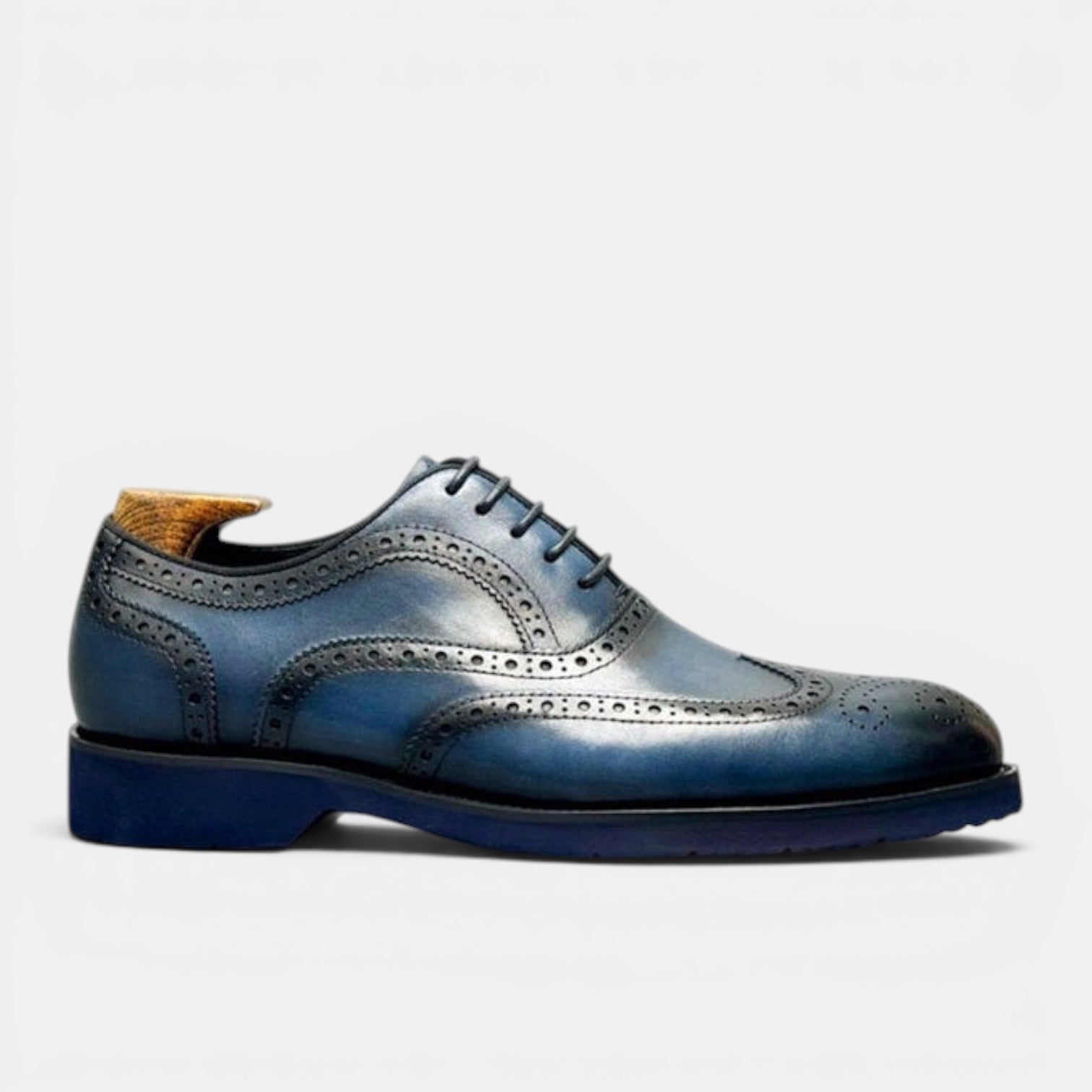 Barcon Getta Inc PORTO-NOVO deep navy blue full grain leather wingtip Oxford dress shoes with brogue detailing and matching rubber sole.