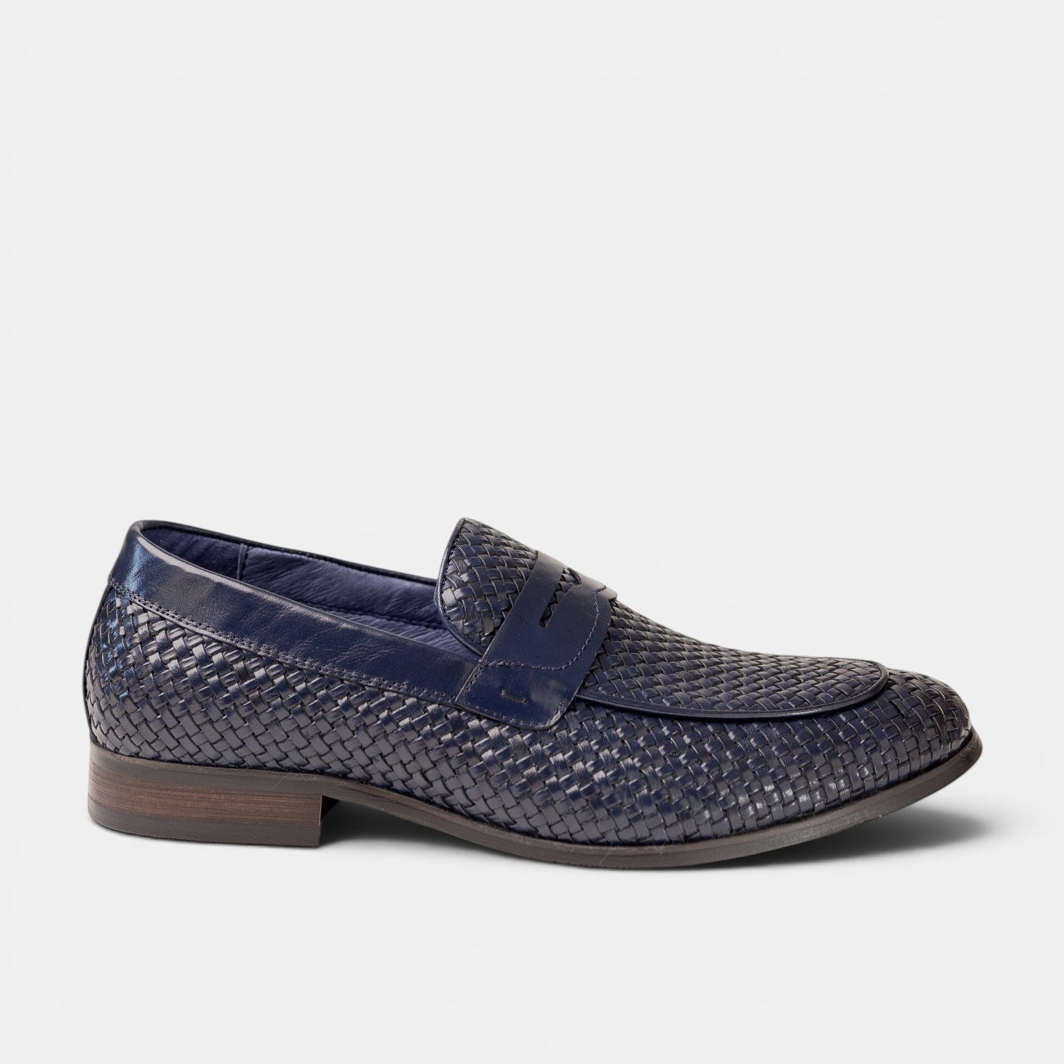 Barcon Getta Inc navy blue woven full-grain leather penny loafer with a smooth leather strap and hybrid sole.