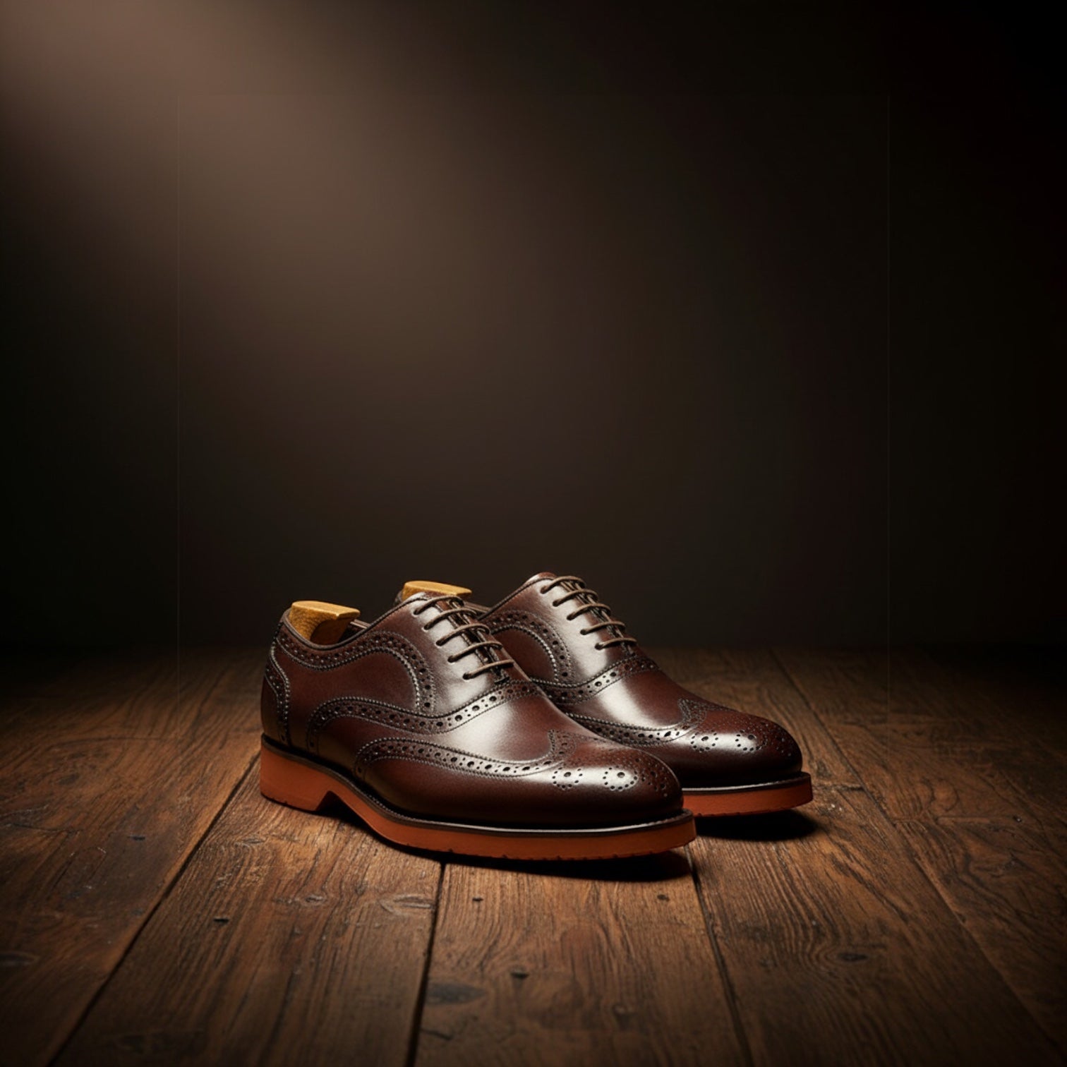 Barcon Getta Inc PORTO-NOVO oxblood dark brown full grain leather wingtip Oxford dress shoes with burnt orange rubber sole.
