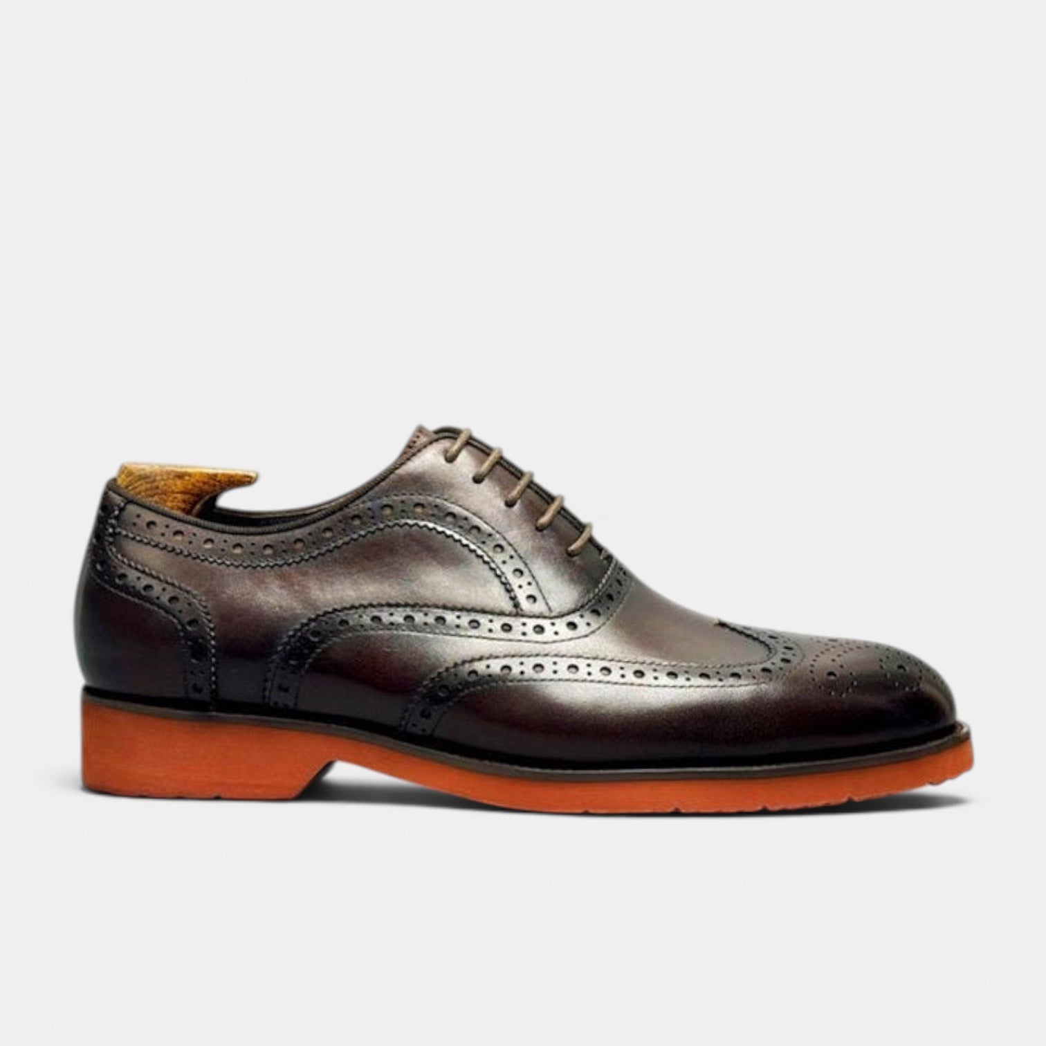Barcon Getta Inc PORTO-NOVO oxblood dark brown full grain leather wingtip Oxford dress shoes with orange rubber sole.