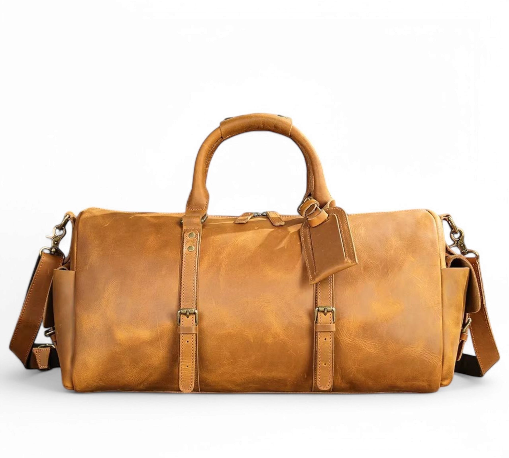 Barcon Getta Inc SAHARA duffel bag in distressed brown genuine leather with antique brass hardware and adjustable strap.