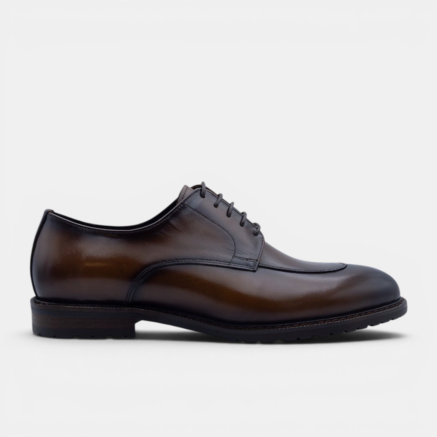 Barcon Getta Inc YOSEF A. split toe derby dress shoes in hand-burnished tobacco brown full grain leather with a chunky lug sole.
