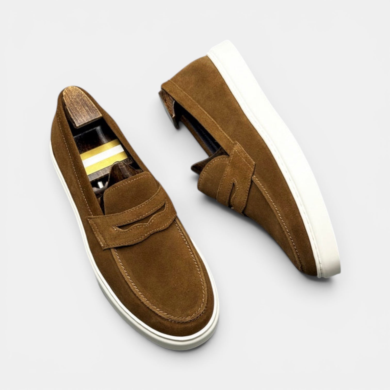 Barcon Getta Inc MEDA Suede Penny Loafer Sneakers in warm tan with white sole and penny saddle strap.