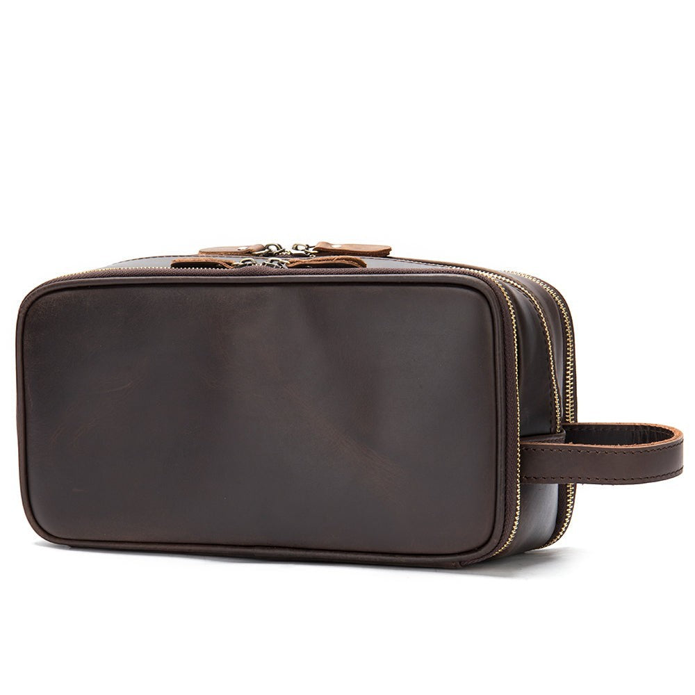Barcon Getta Inc dark brown genuine leather travel toiletry bag with dual zippers and side handle.