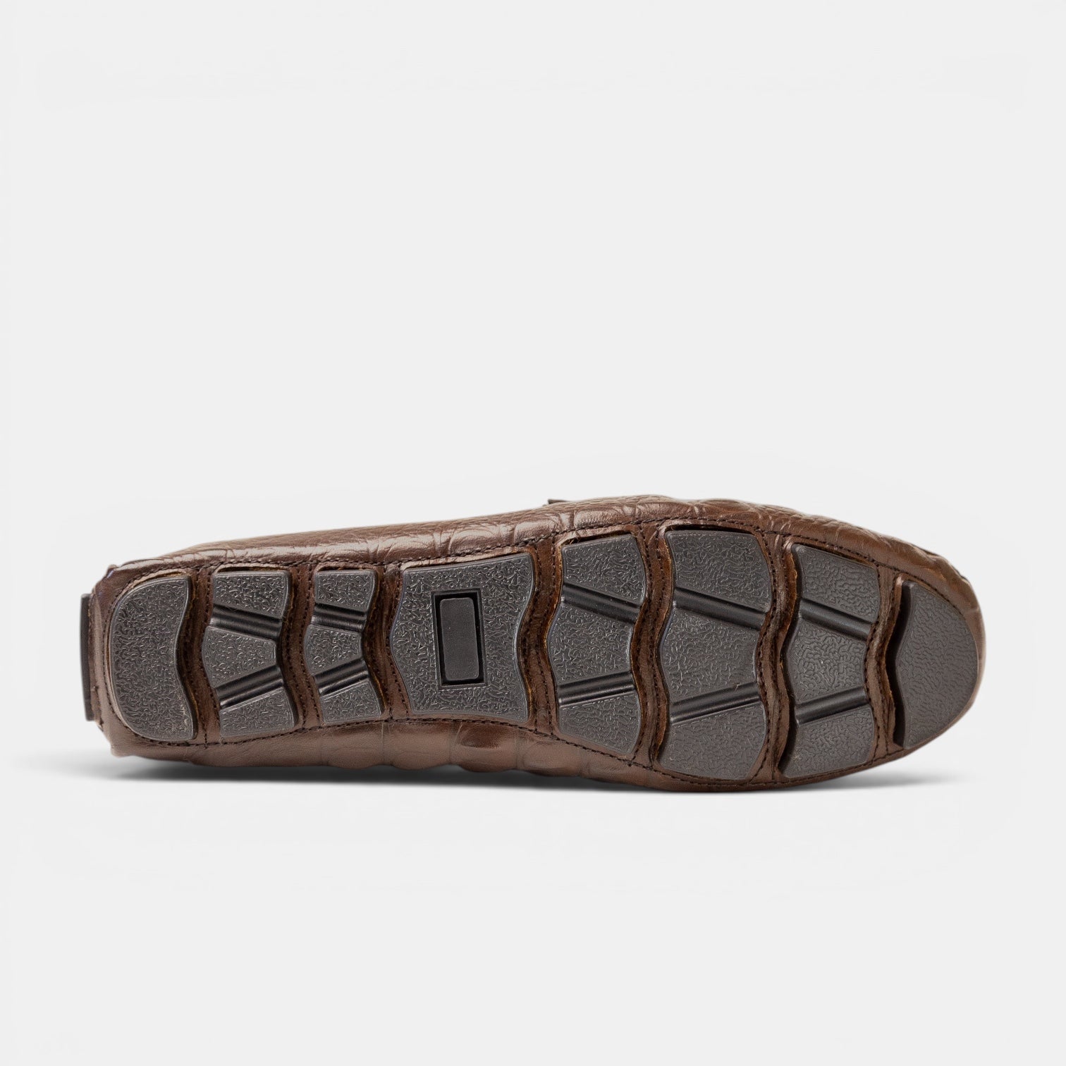 Barcon Getta Inc ARBA-MINCH taupe crocodile-embossed leather driving loafers with rubber sole and gunmetal bit.