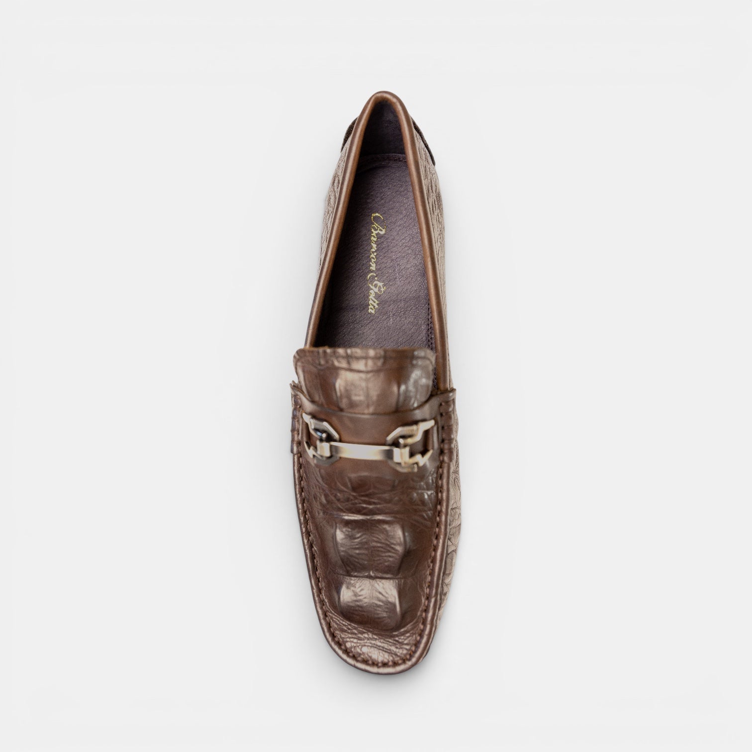 Barcon Getta Inc taupe crocodile-embossed leather driving loafers with gunmetal snaffle bit hardware.
