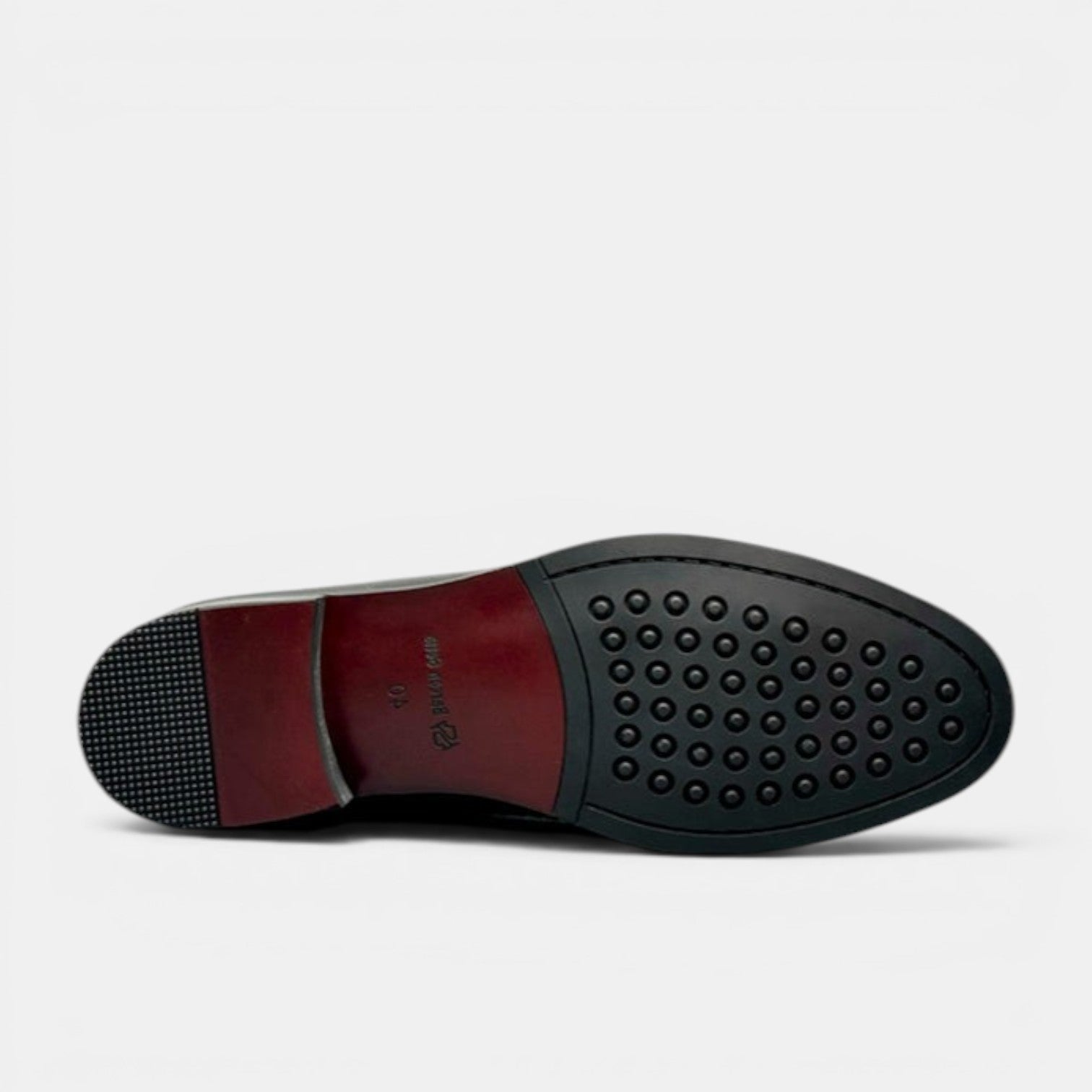 Barcon Getta Inc RABAT black leather ankle boots sole view with textured grip and maroon heel accent.