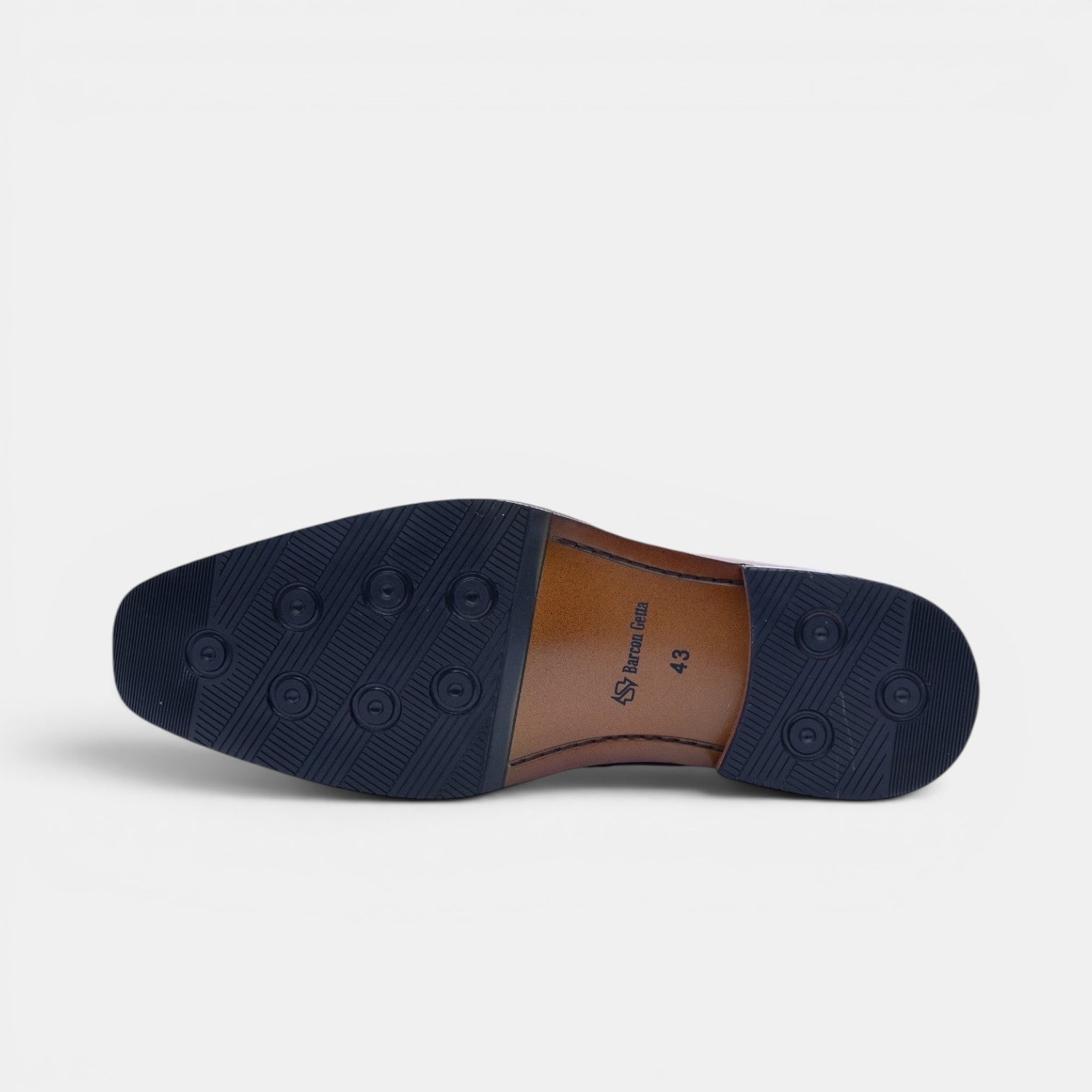 Barcon Getta Inc NEGUS black leather penny loafer sole with metal accent detail and durable rubber.