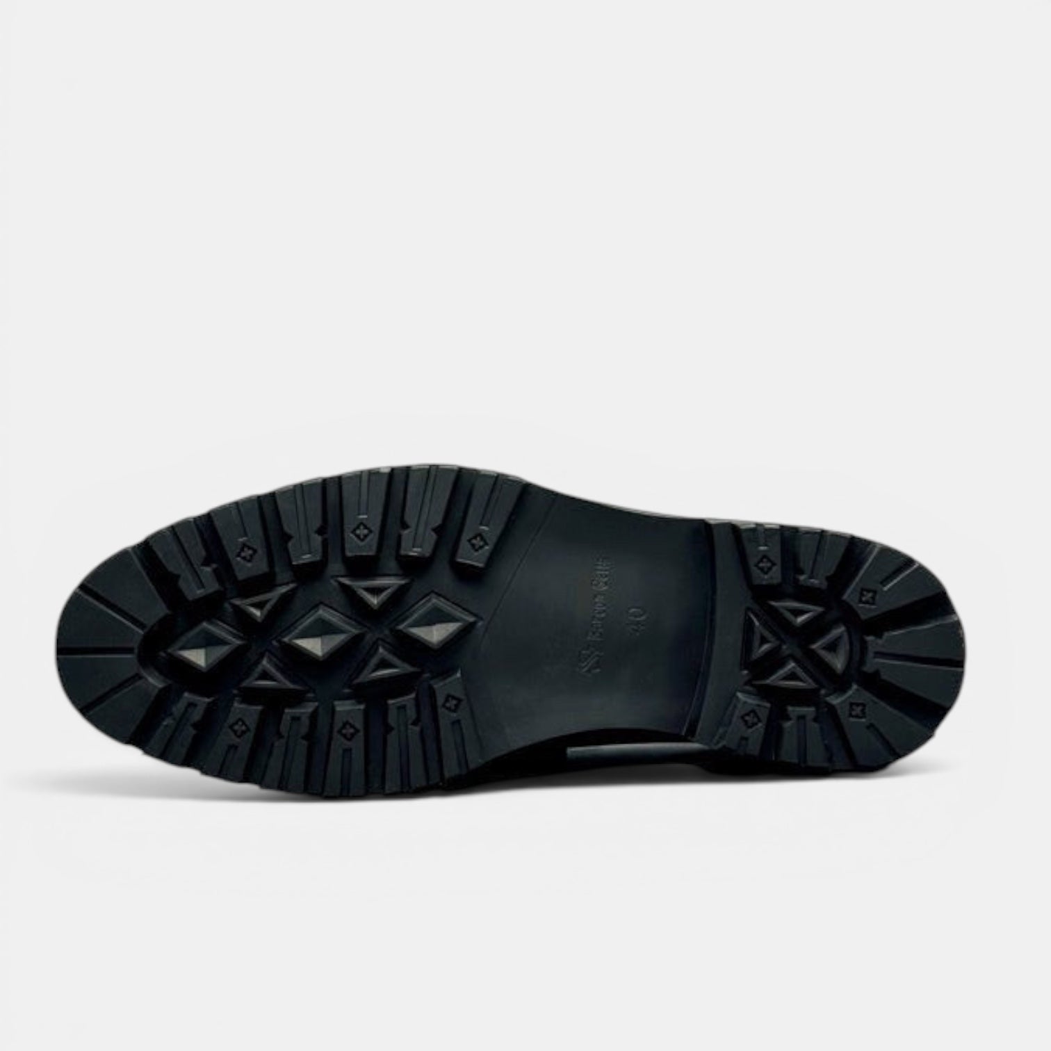 Barcon Getta Inc NIAMEY black leather penny loafers with a durable lug sole.