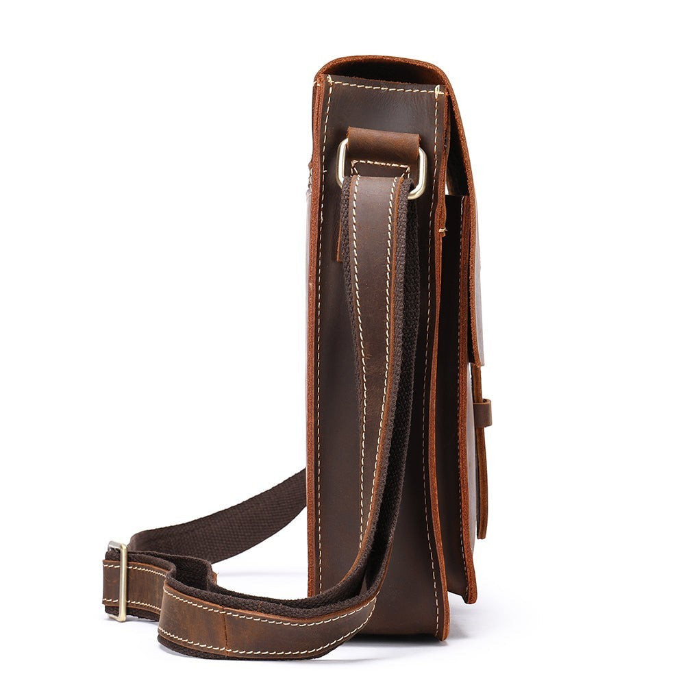Barcon Getta Inc HARBORSIDE dark brown full grain leather shoulder bag with adjustable strap and multiple compartments.