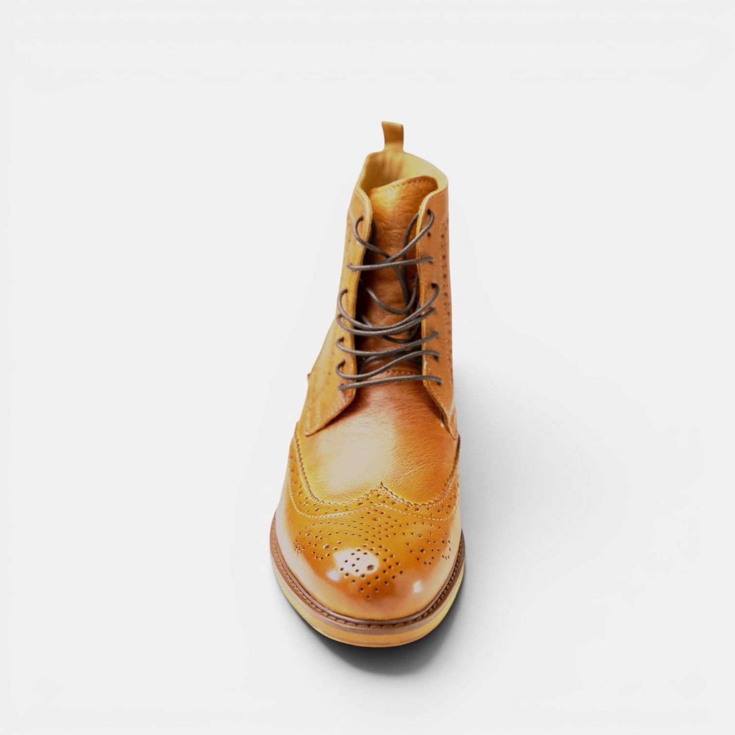Barcon Getta Inc NAIROBI tan leather wingtip lace-up boots with brogue detailing.