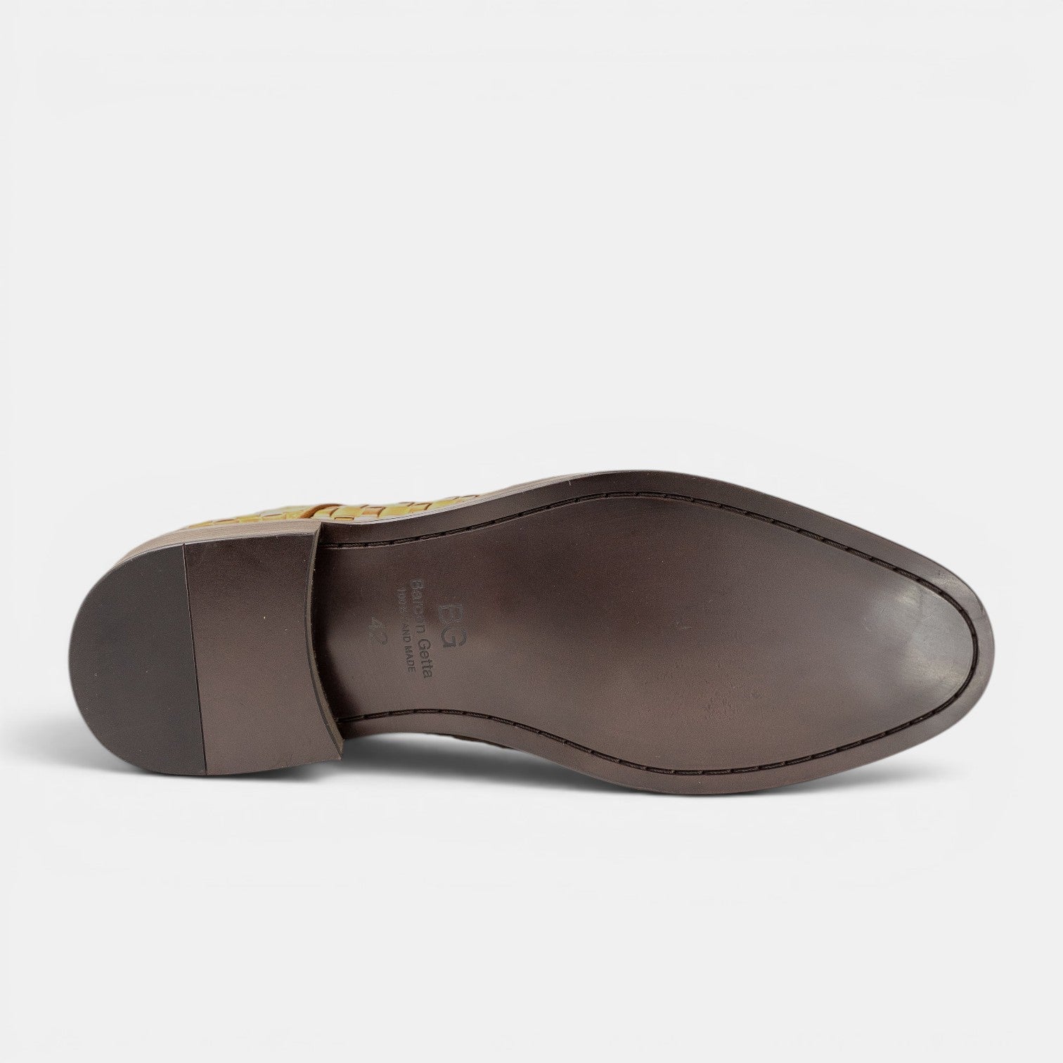 Barcon Getta DAR ES SALAAM woven tan leather lace-up ankle boots, sole view.