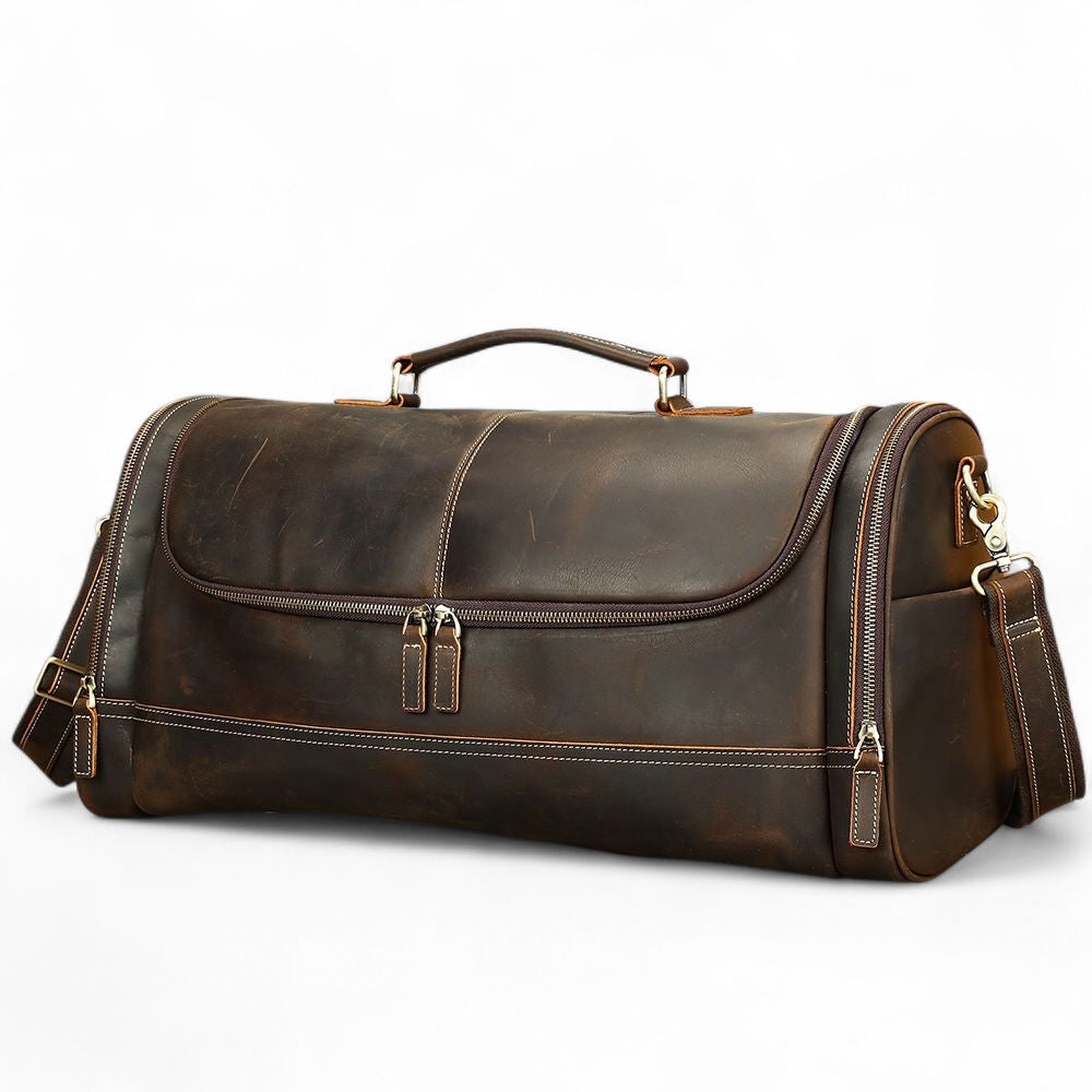 Brown leather duffel bag on a white background